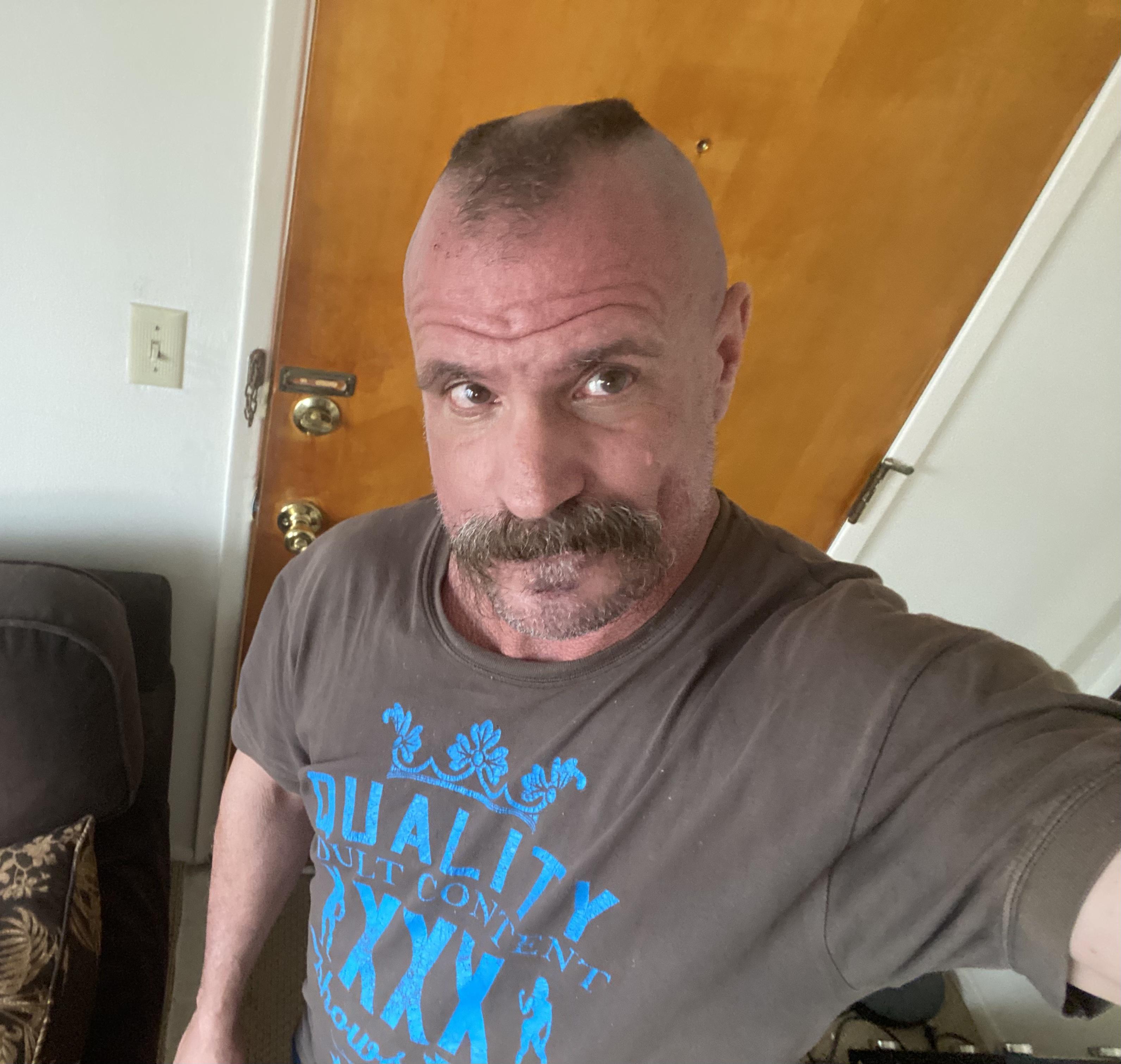 USMC style Horseshoe Flattop. Razor shaved all the way up the sides and