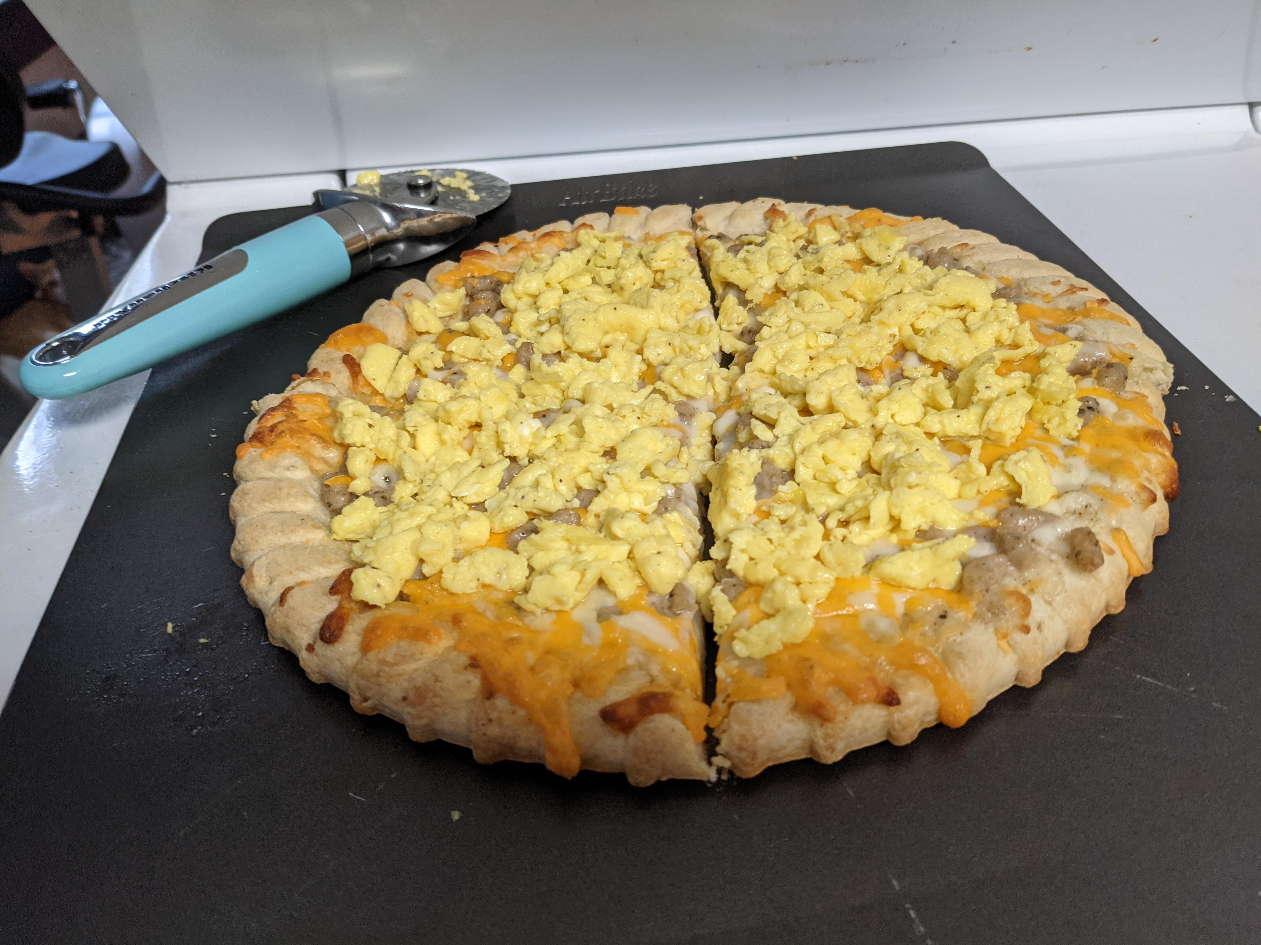 Added egg to the this biscuits & gravy frozen pizza. r/PutAnEggOnIt