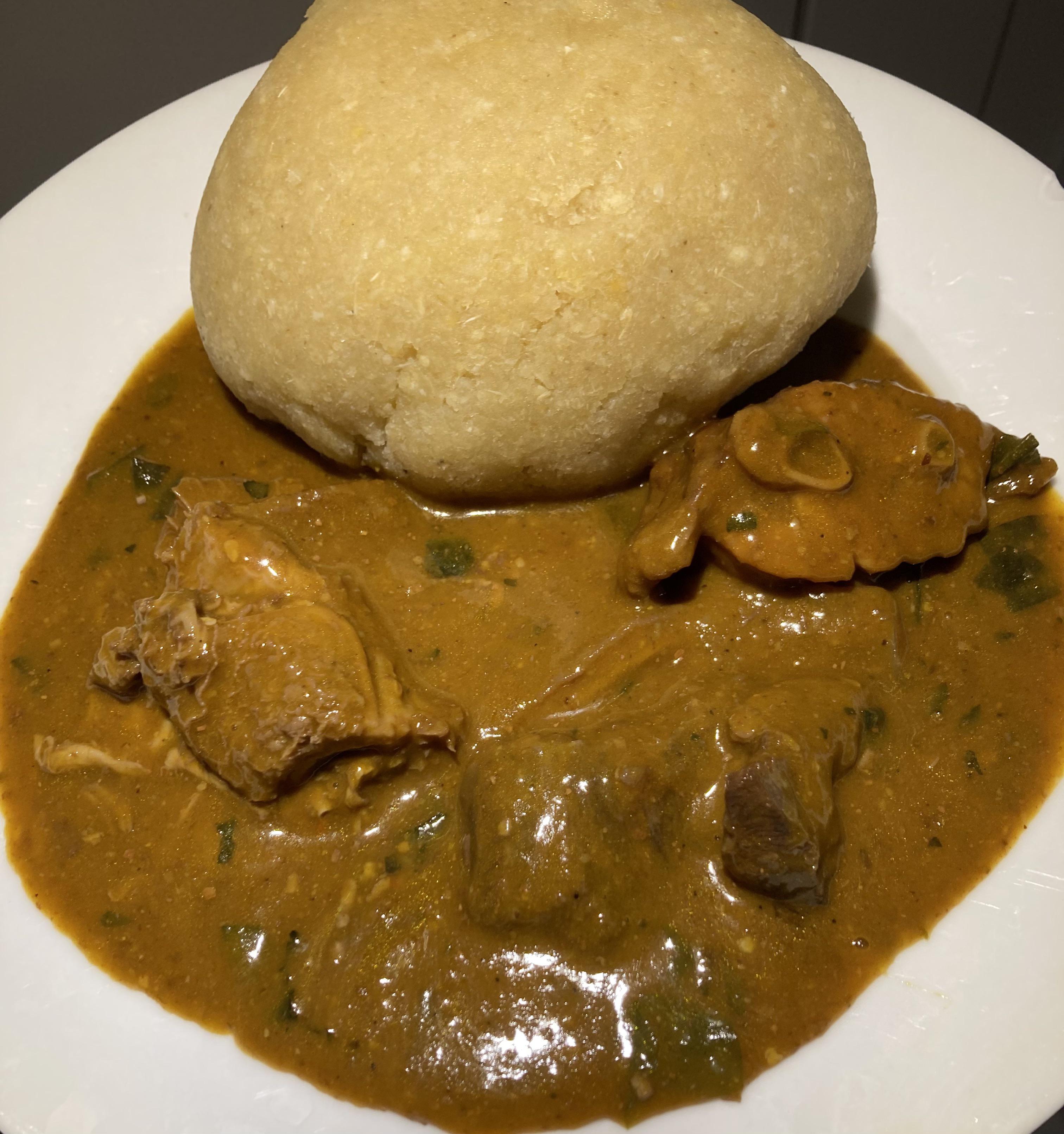 Nigerian Ogbono soup with mixed meats and eba. r/UK_Food