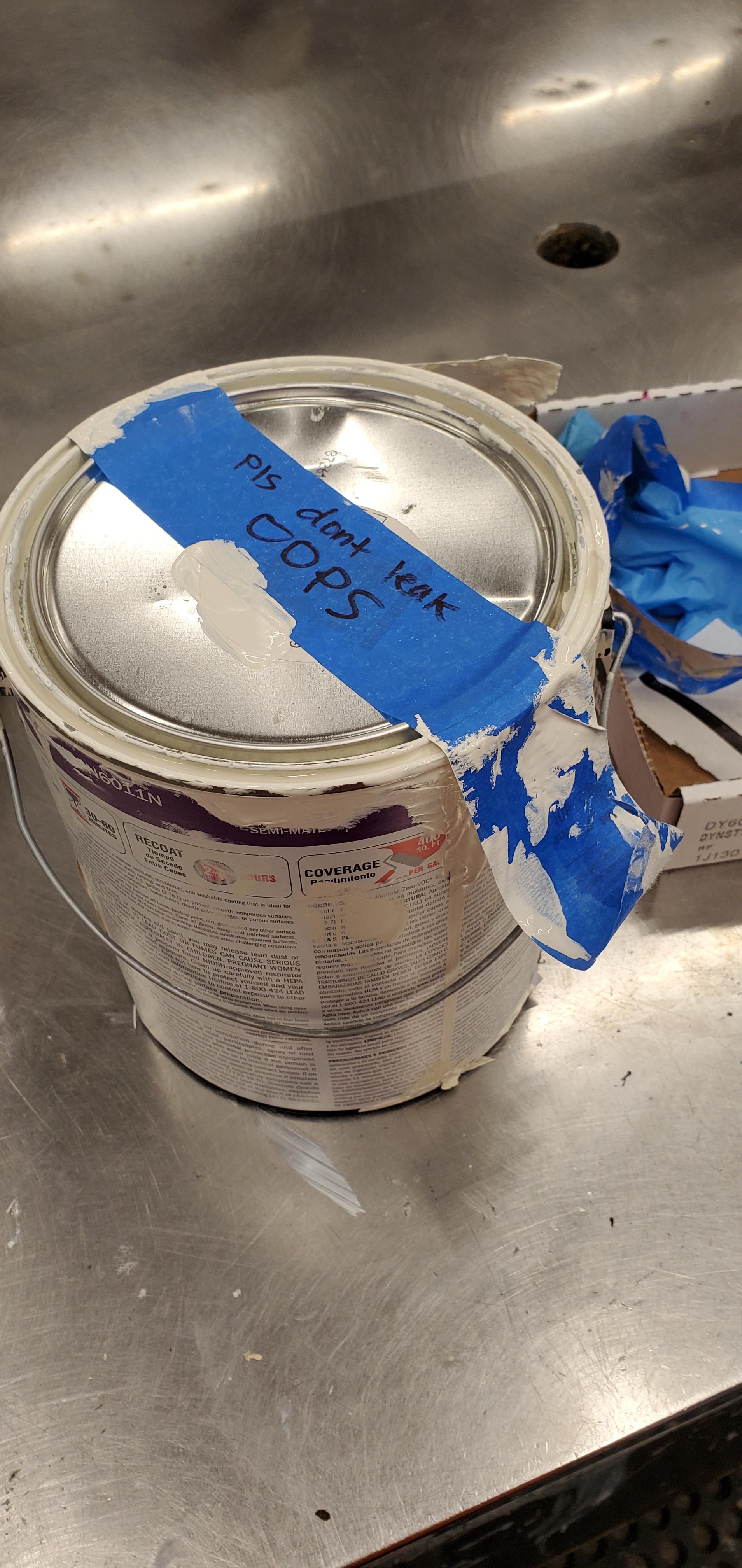 I bonked the lid real good, bathed it in tape, and asked him nicely not