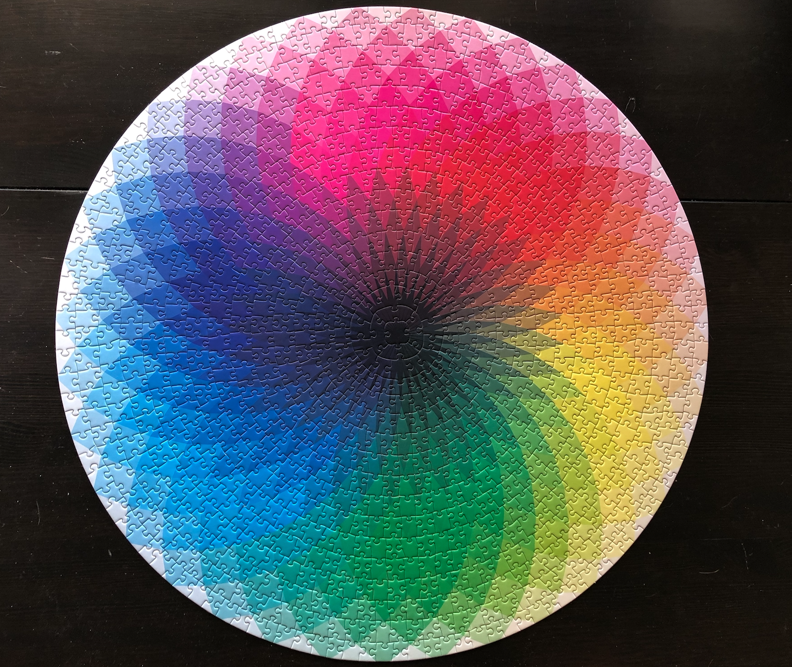 Blazing with Color Round Puzzle; Toywea International; 1000 pieces. One of my new favorites