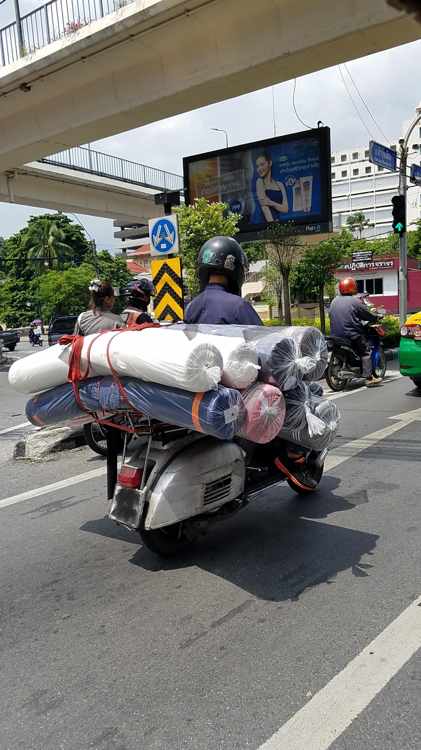 Carpet delivery guy, Thailand. r/mildlyinteresting