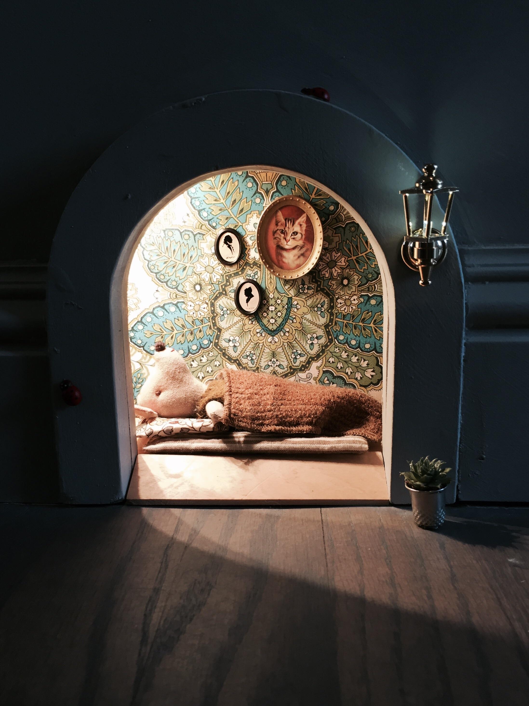 The mouse hole we put in the wall when we gutted our house. The light