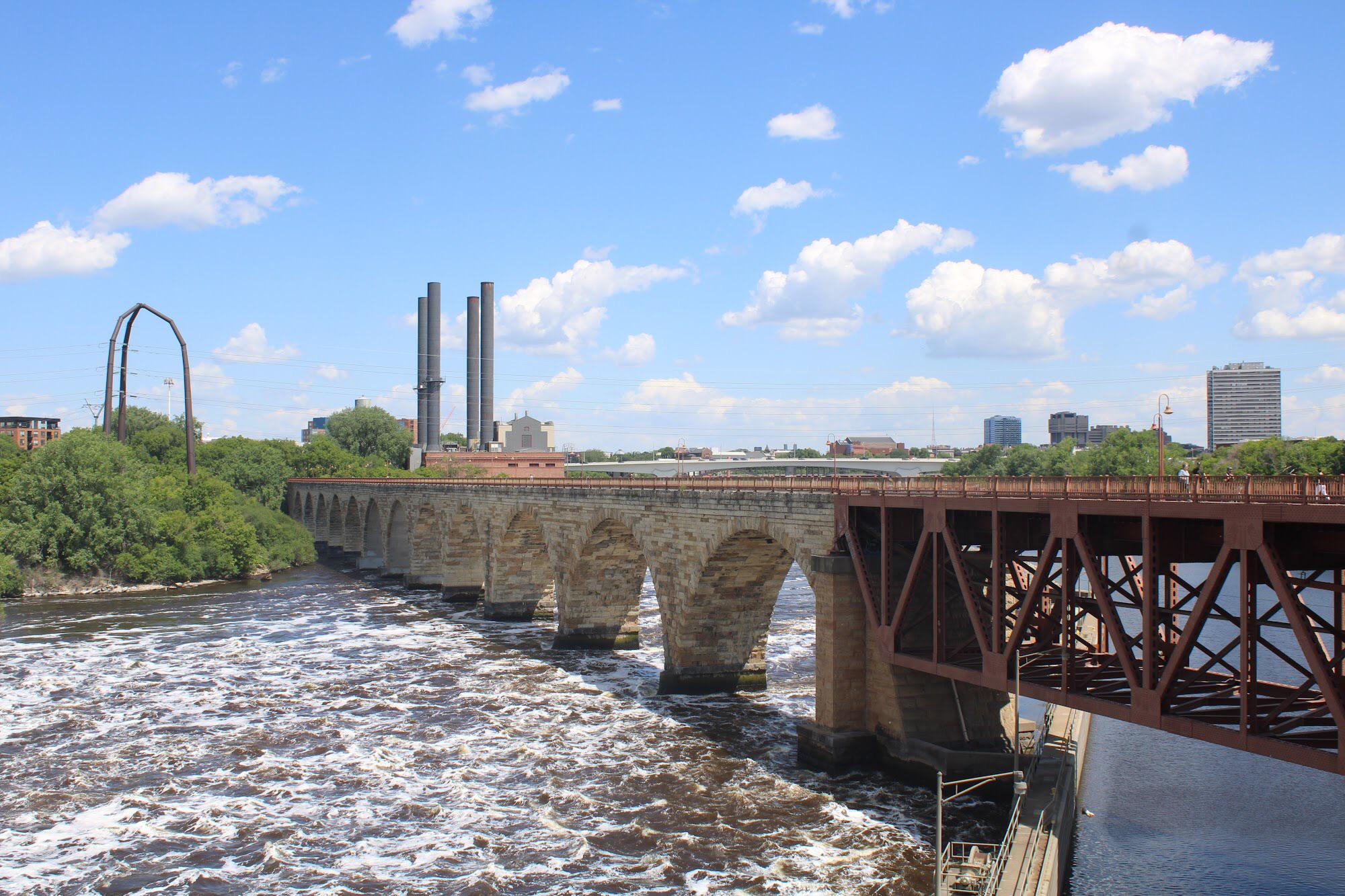 1883 Stone Arch Bridge crosses the Mississippi River between