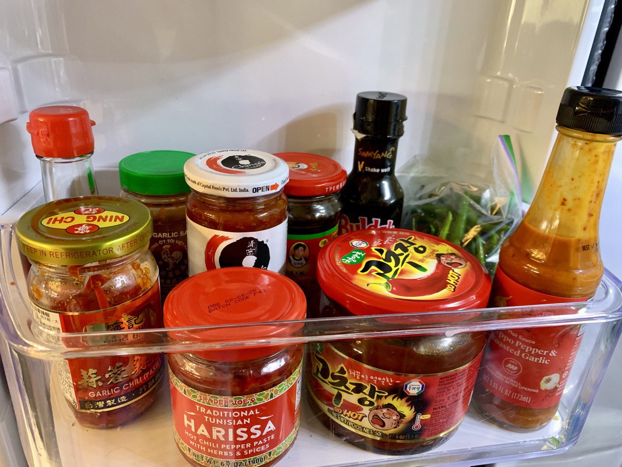 my chili pepper fridge shelf brings me joy r/spicy