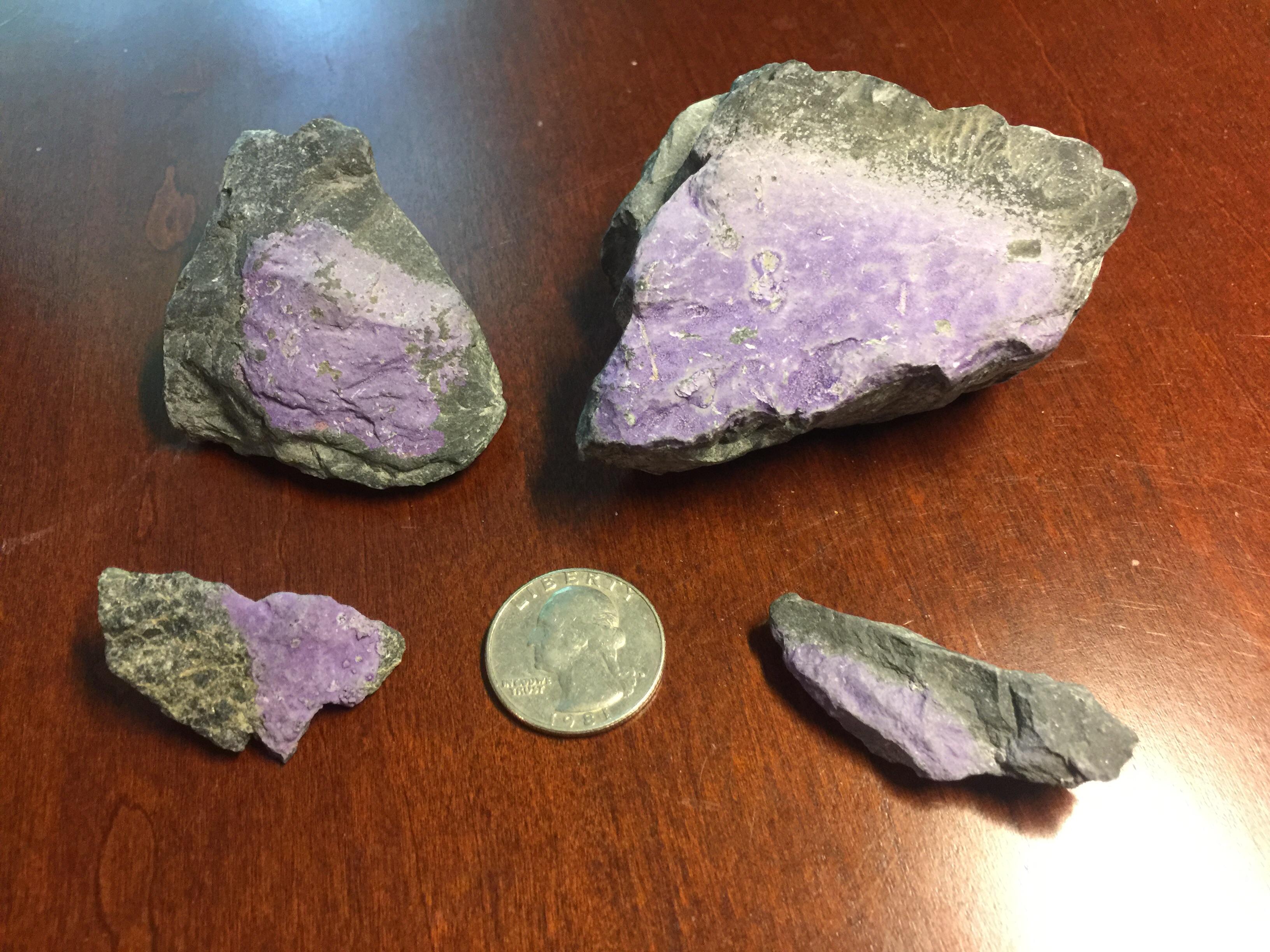 Cool purple mineral in gravel. Thoughts on what this is? From a gravel