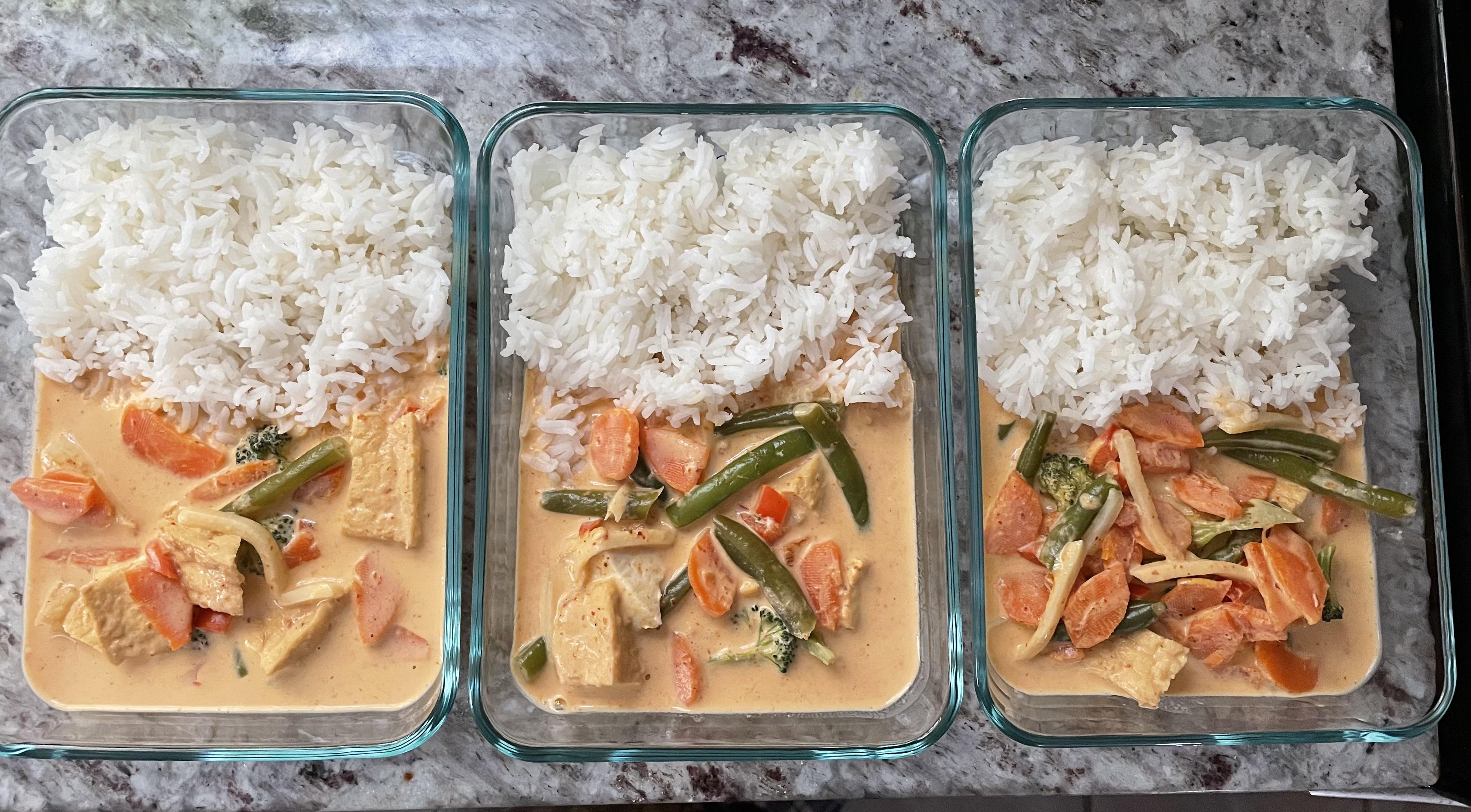 Homemade tofu red curry with broccoli, carrots, bamboo shoots, red pepper, green beans and