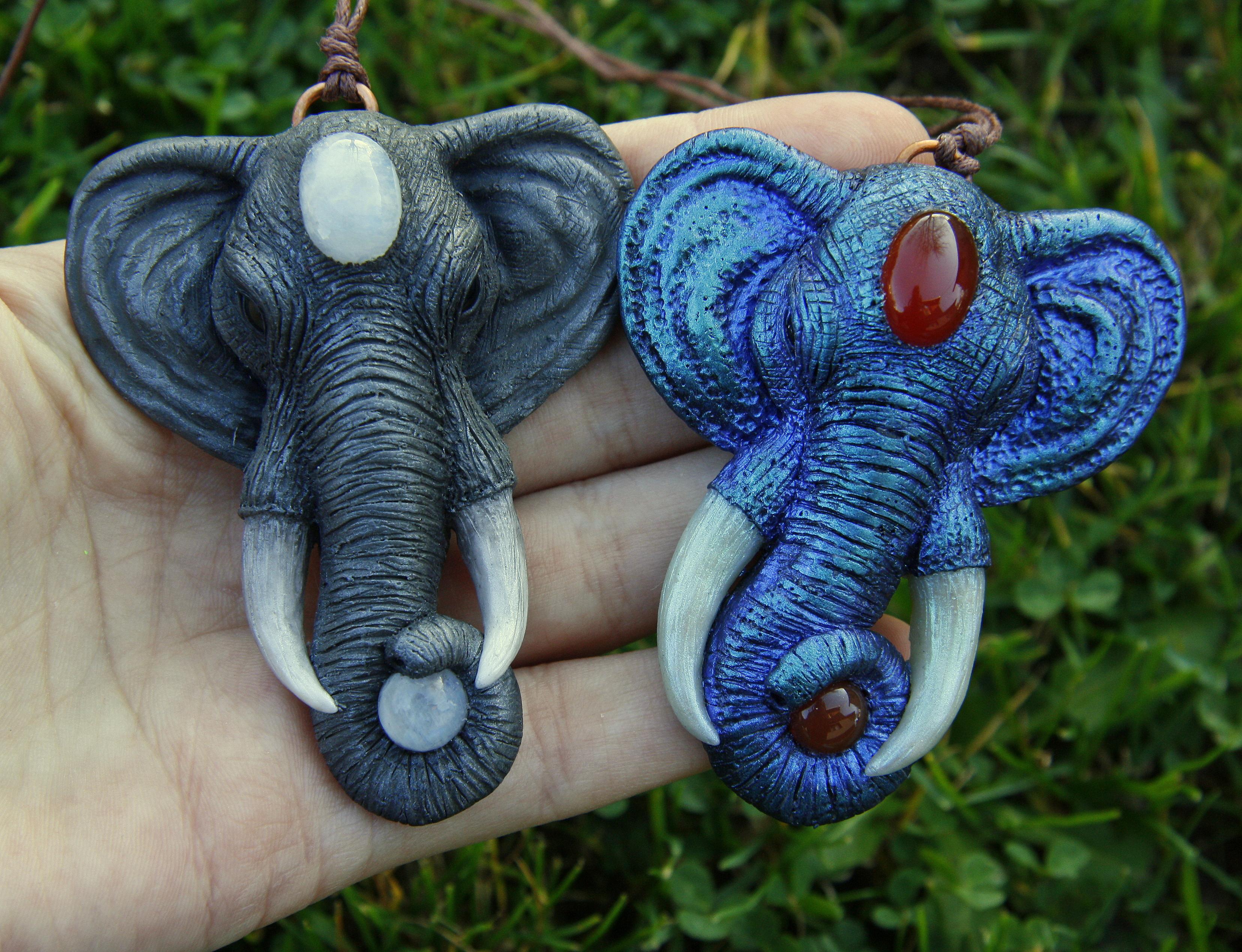 Polymer clay elephant pendant I made recently, one is decorated with moonstones and the other