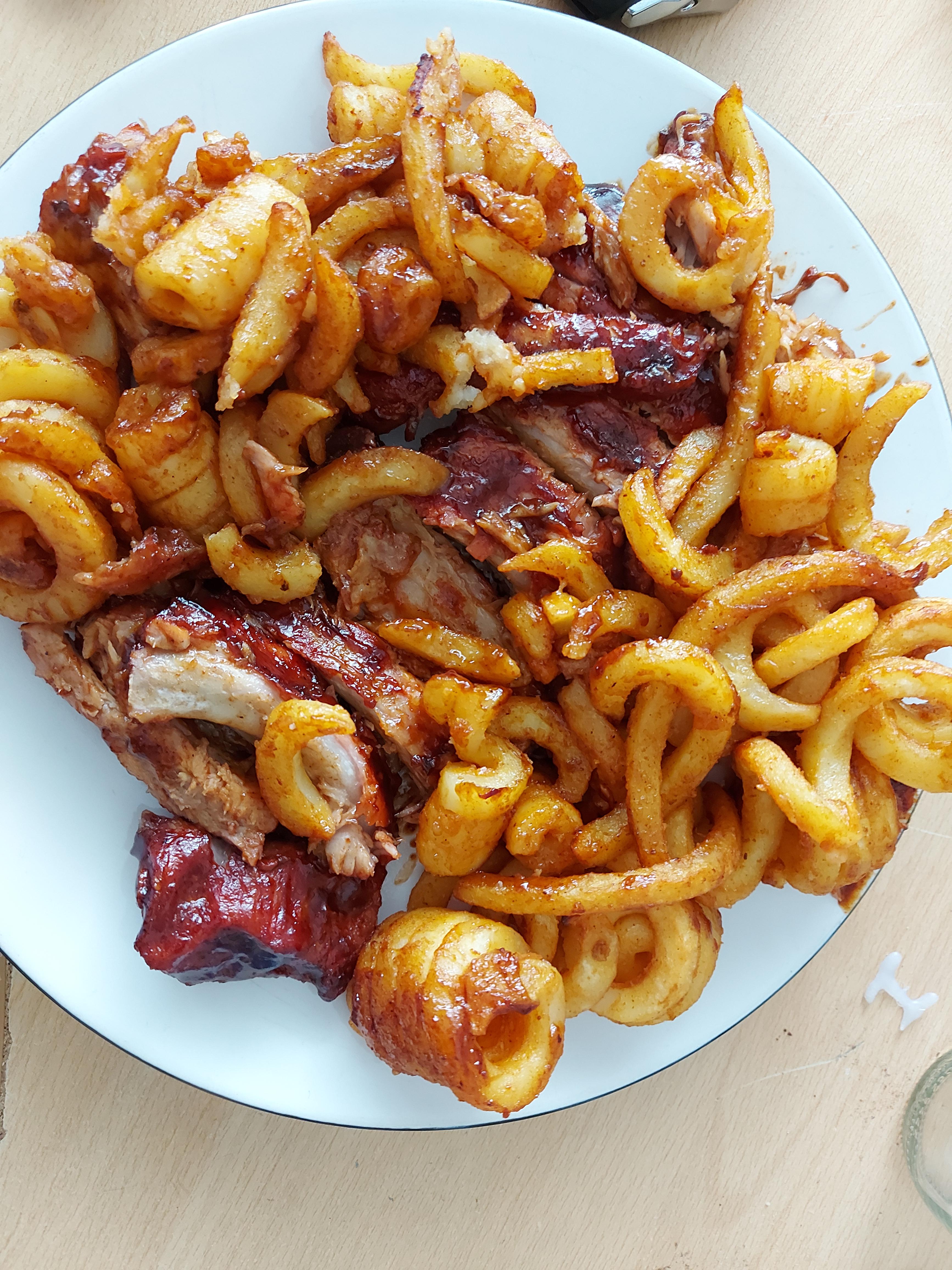 [I ate] a rack of ribs and some curly fries food