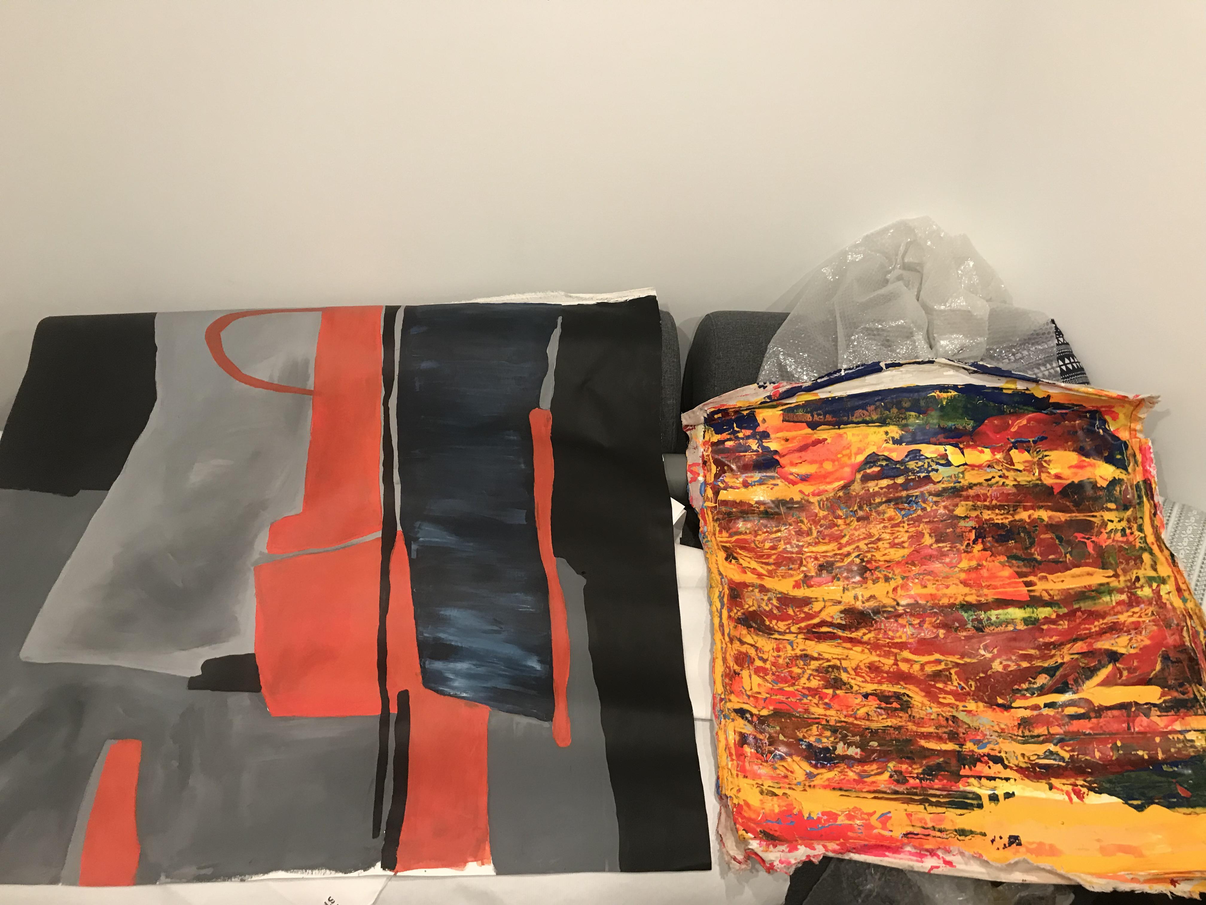 Where can I stretch two painted canvases? Bought artwork recently (very