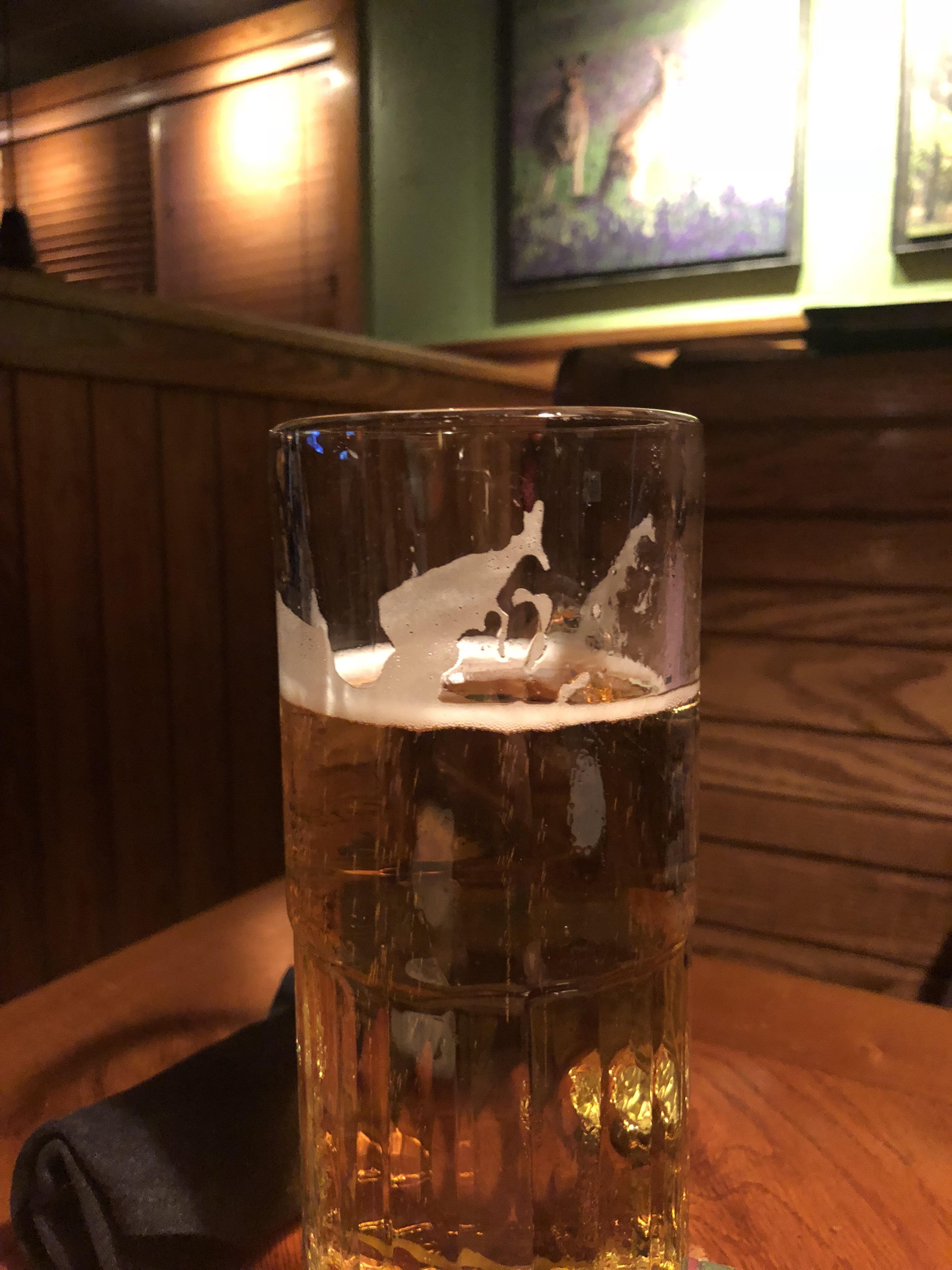After my first sip the froth of my beer at Outback Steakhouse formed a