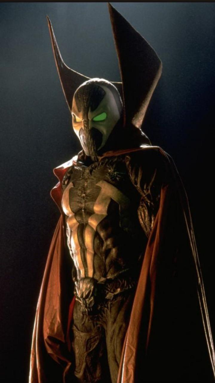 why does spawn have a practical cape in the posters yet completely