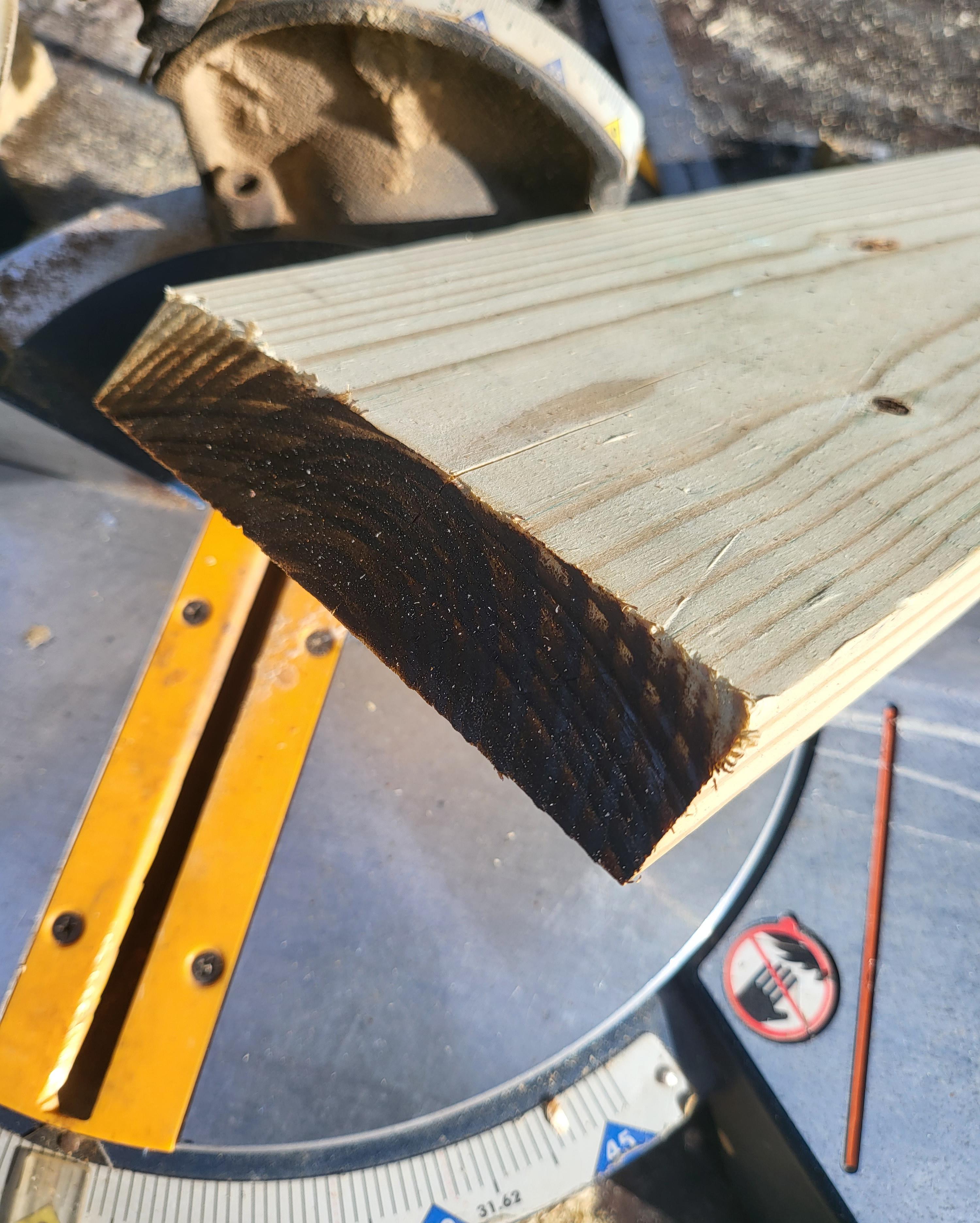 any idea why this is happening? 45 cut in 3/4 pressure treated. Blade