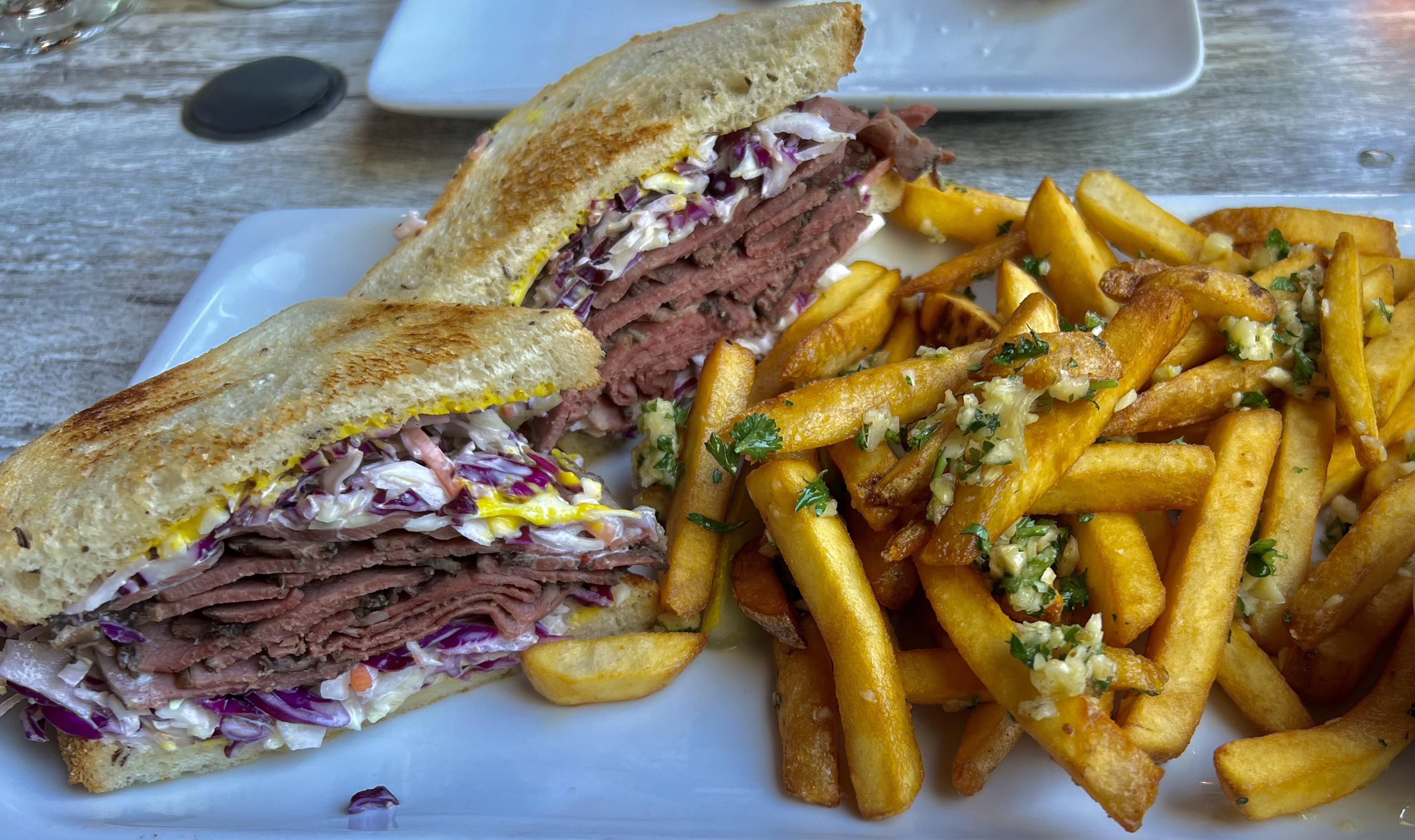Pastrami, wasabi coleslaw on Rye. With Garlic fries. r/FoodPorn