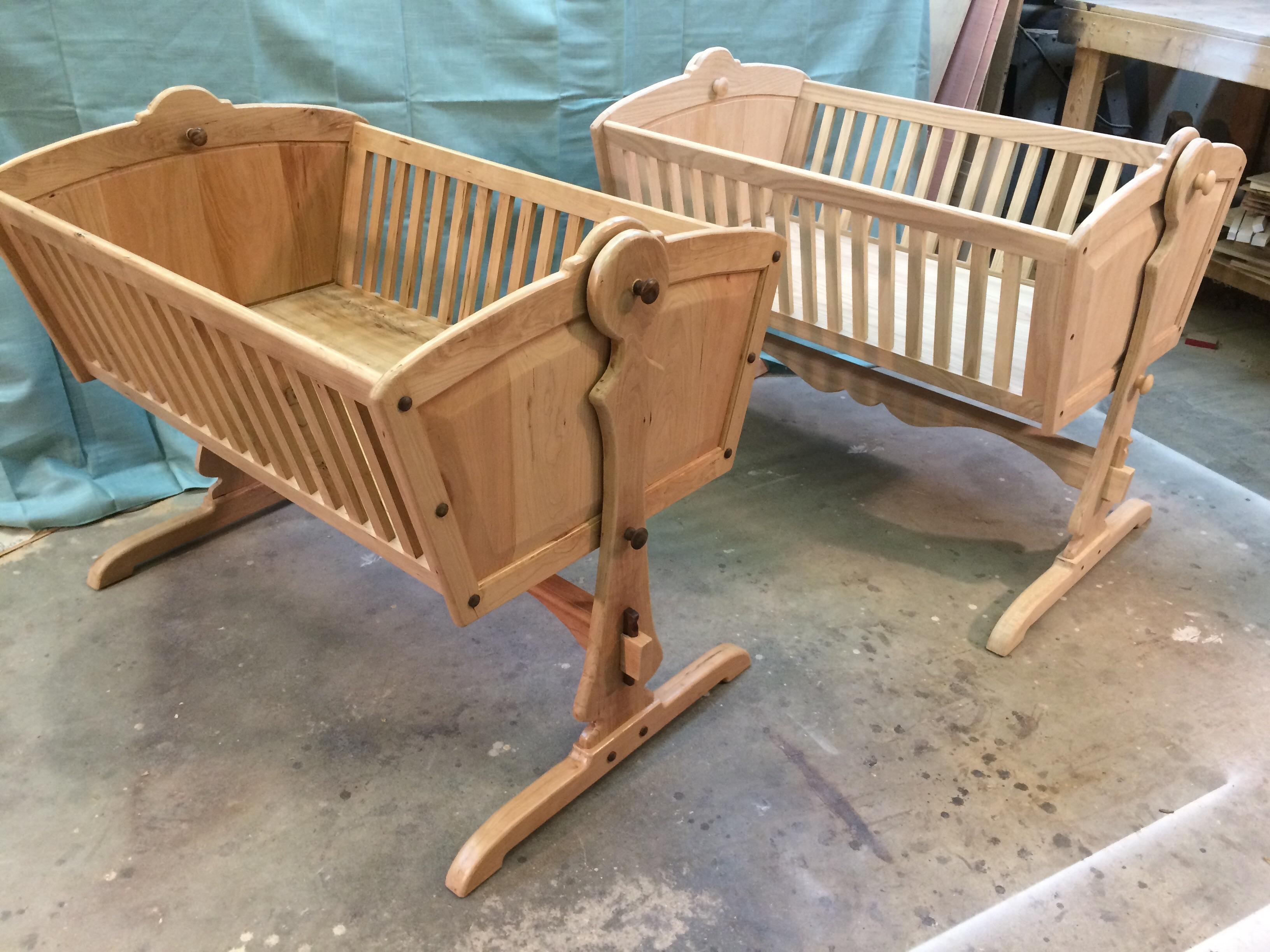Pair of heirloom cradles i made. Cherry on the left for us, oak on the