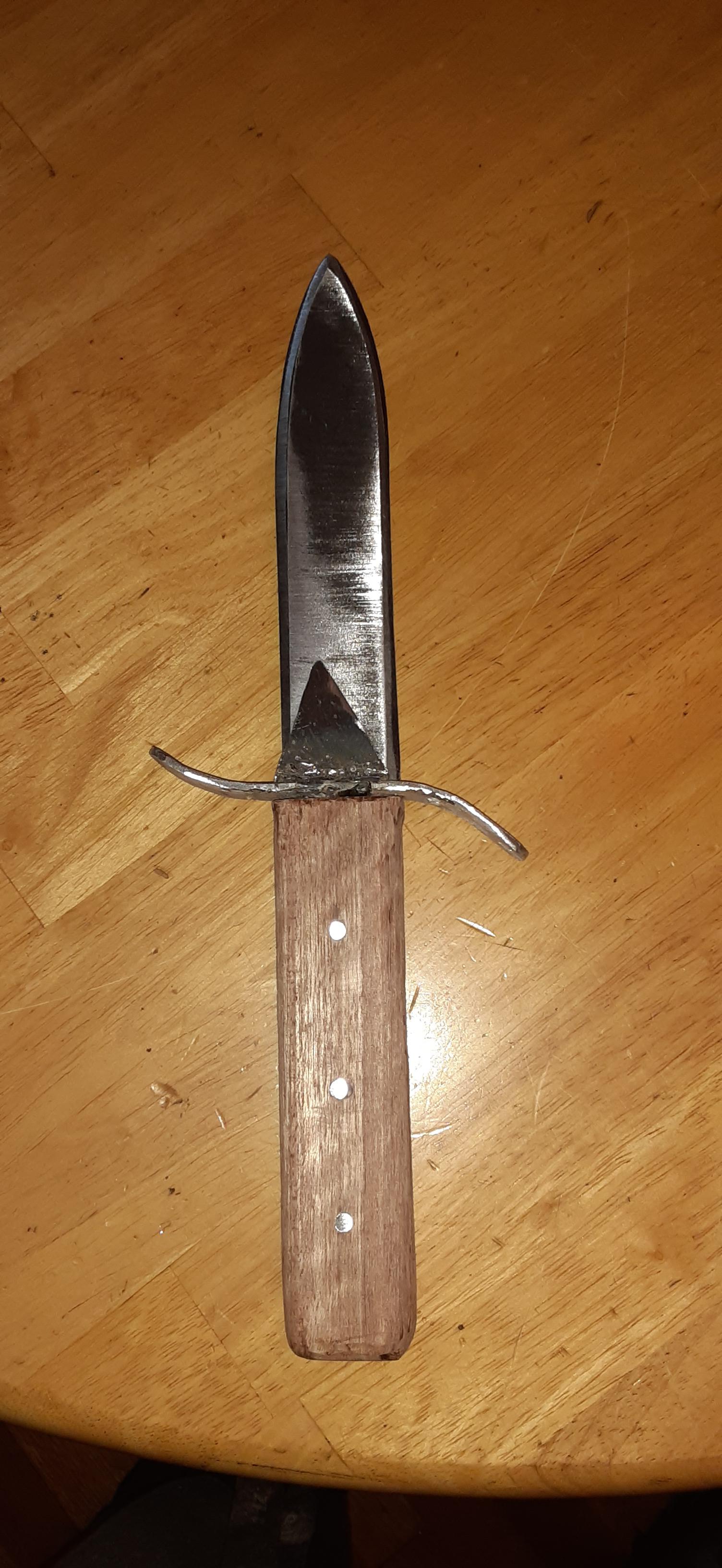 My first knife. Not sure what the steel is, got it from lowes. Handle