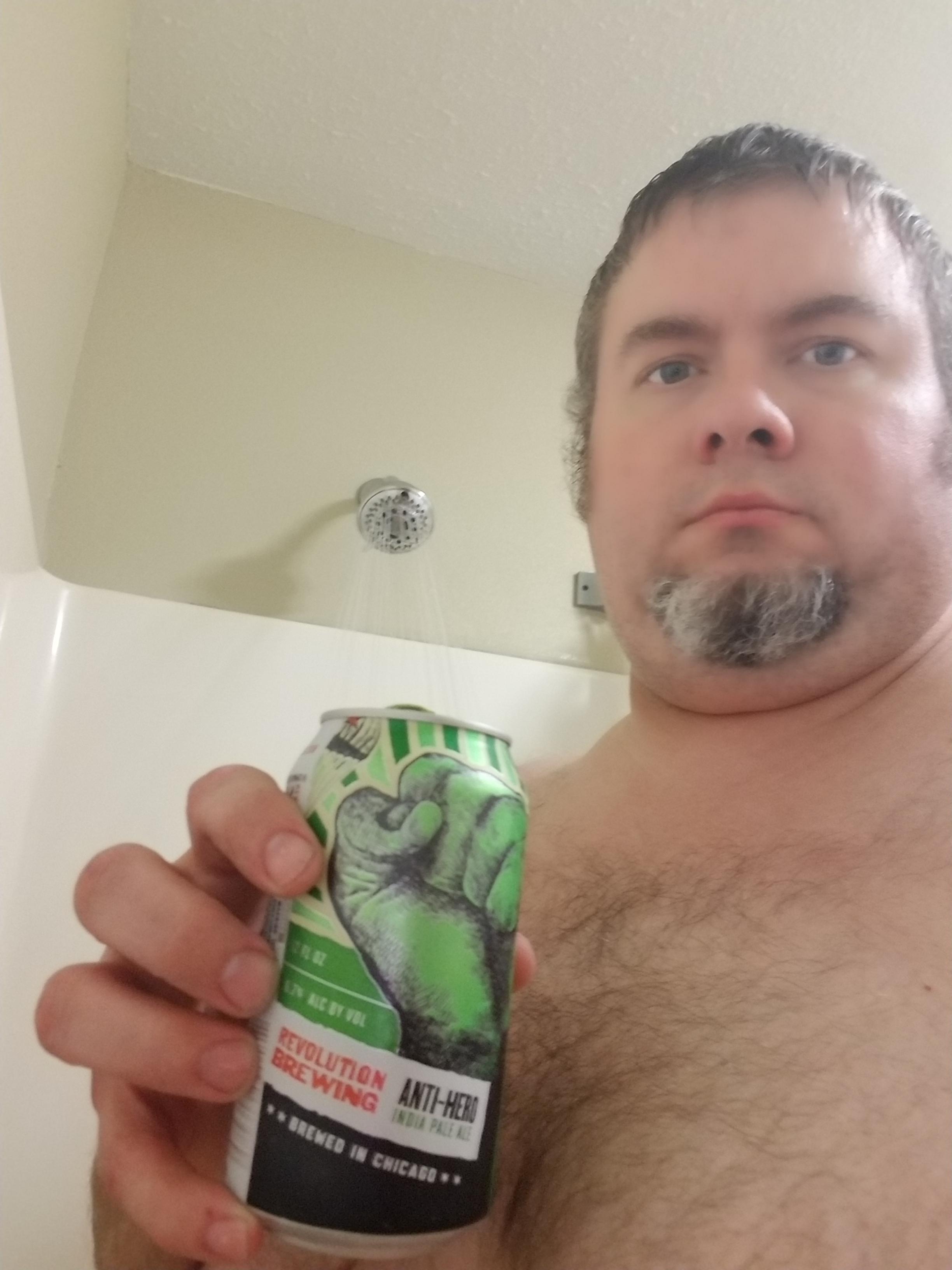 Morning shower after a long night at work. Complimentary hotel beer