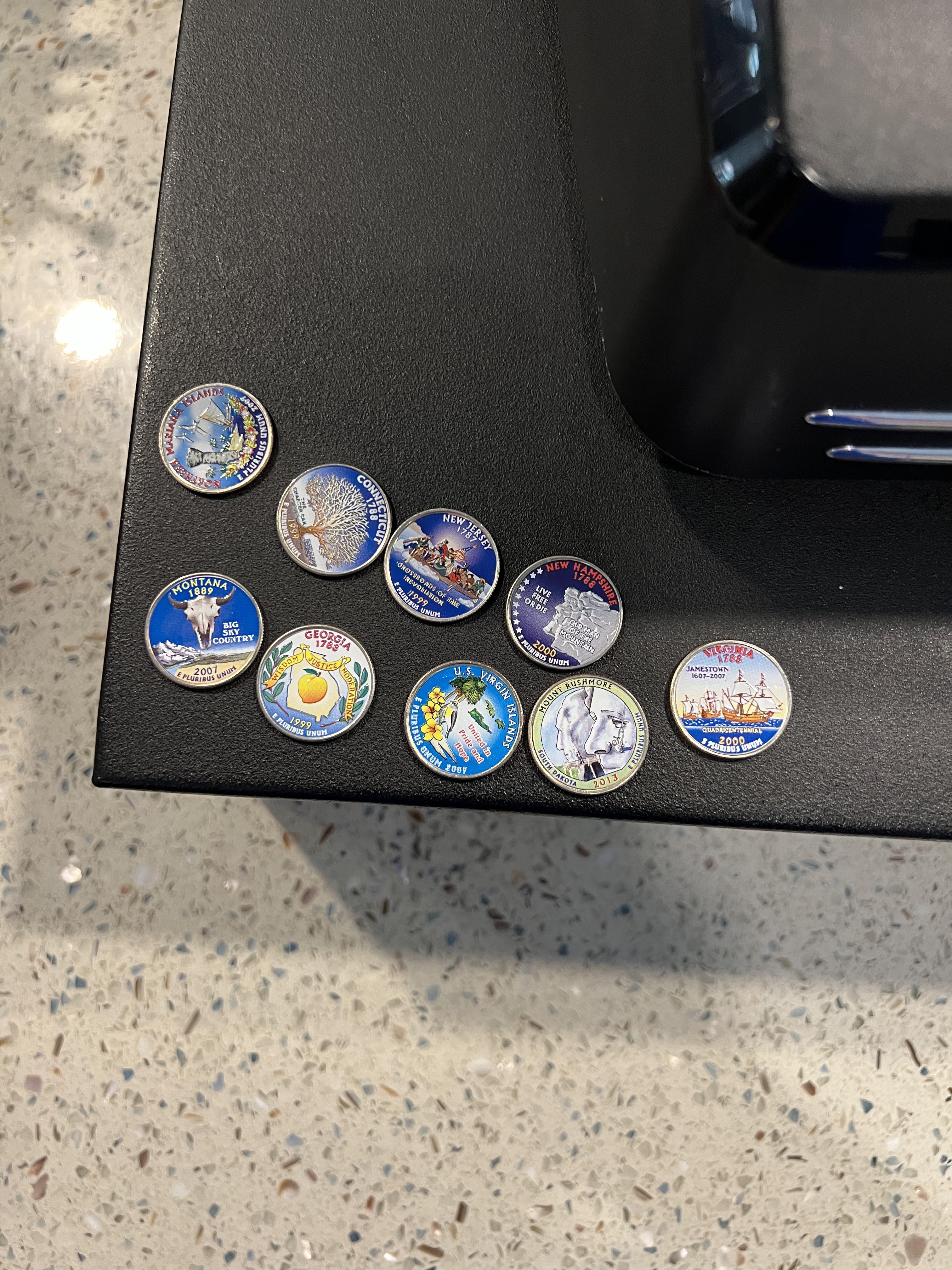 Found these painted quarters in a coin roll at my job r/mildlyinteresting