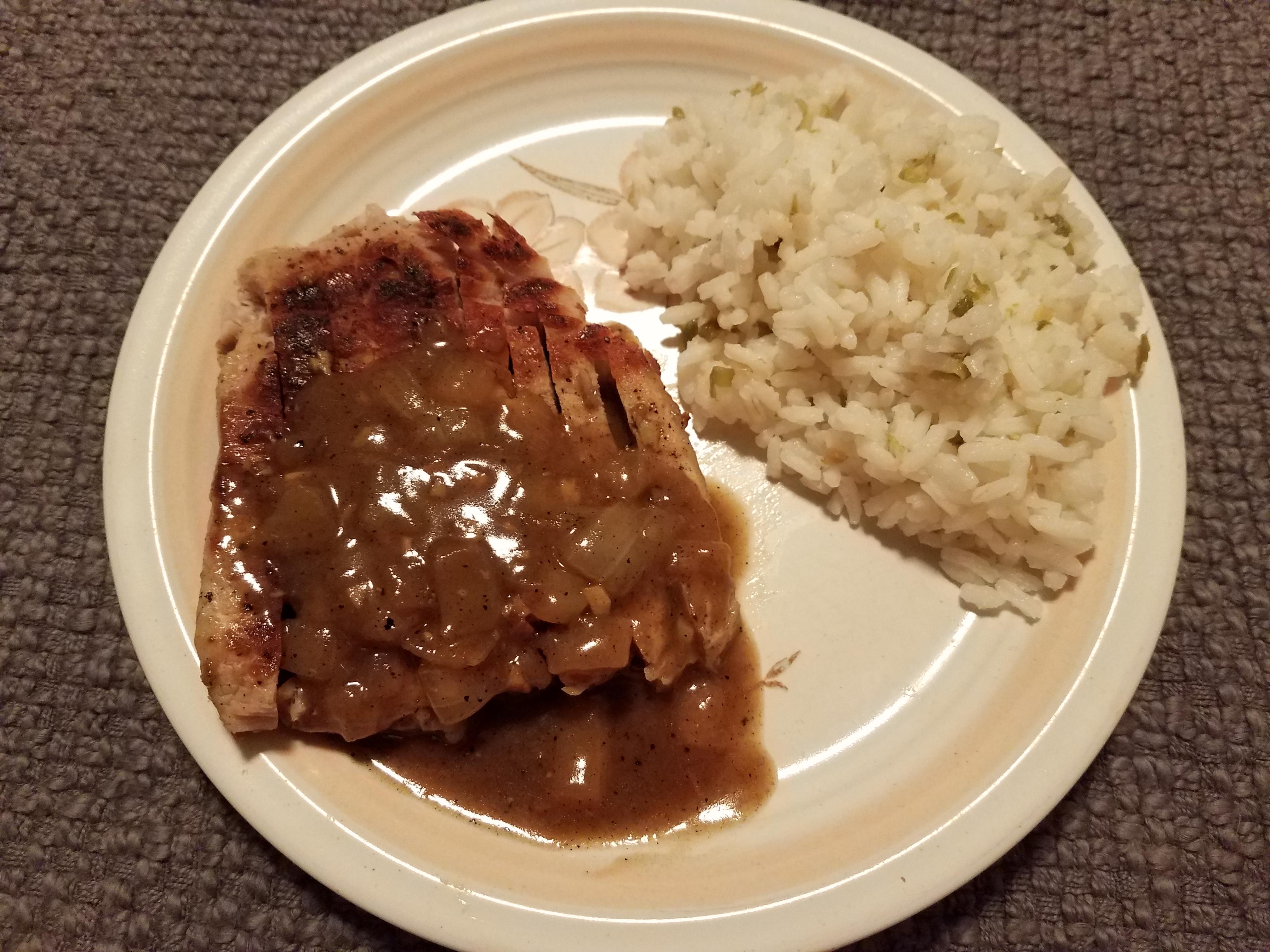 Skillet porkchops with gravy, and white rice with serrano 207 calories r/1500isplenty