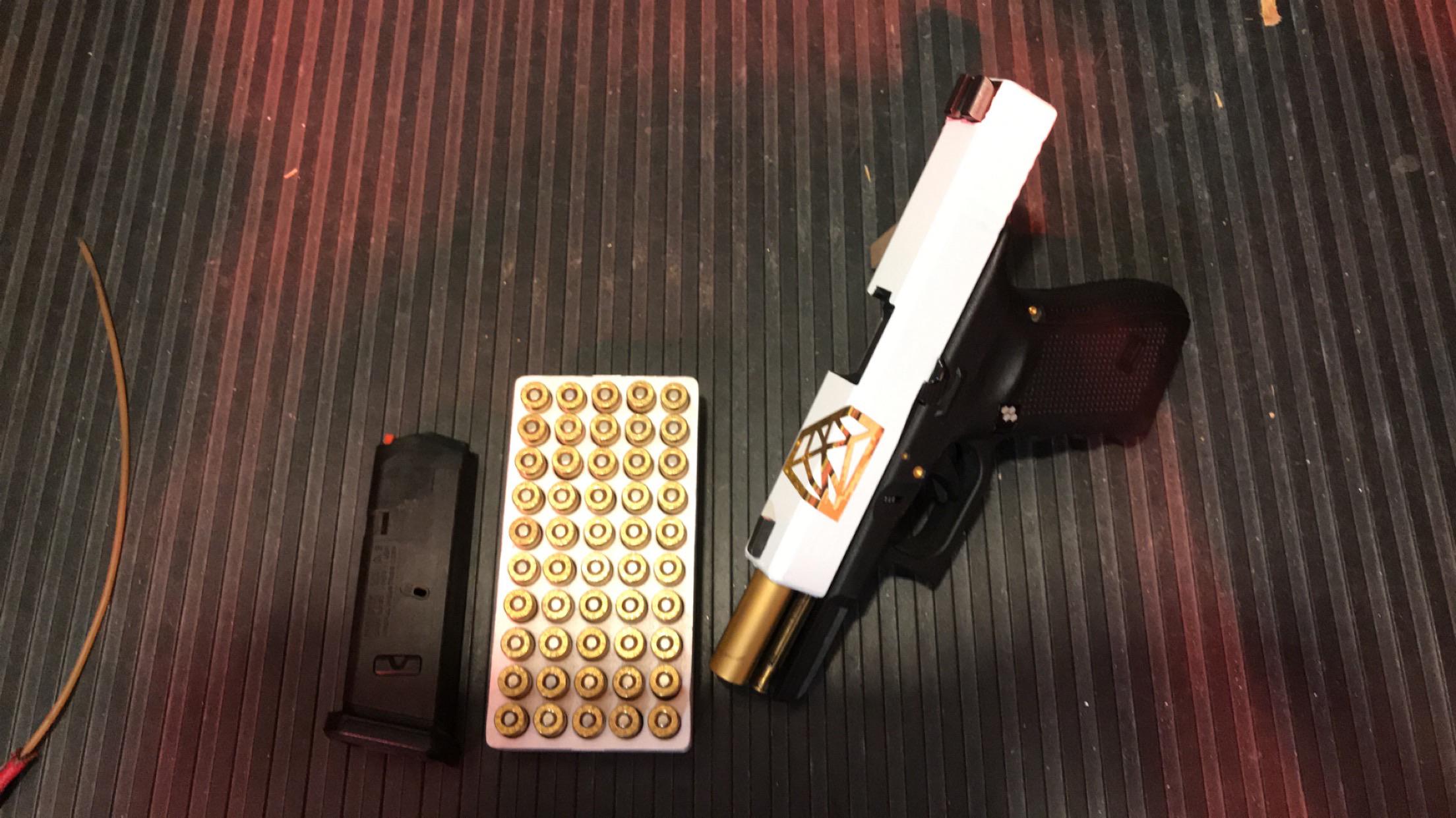 Glock 19 gen 4 white wrap with gold chrome graphic to match my gold