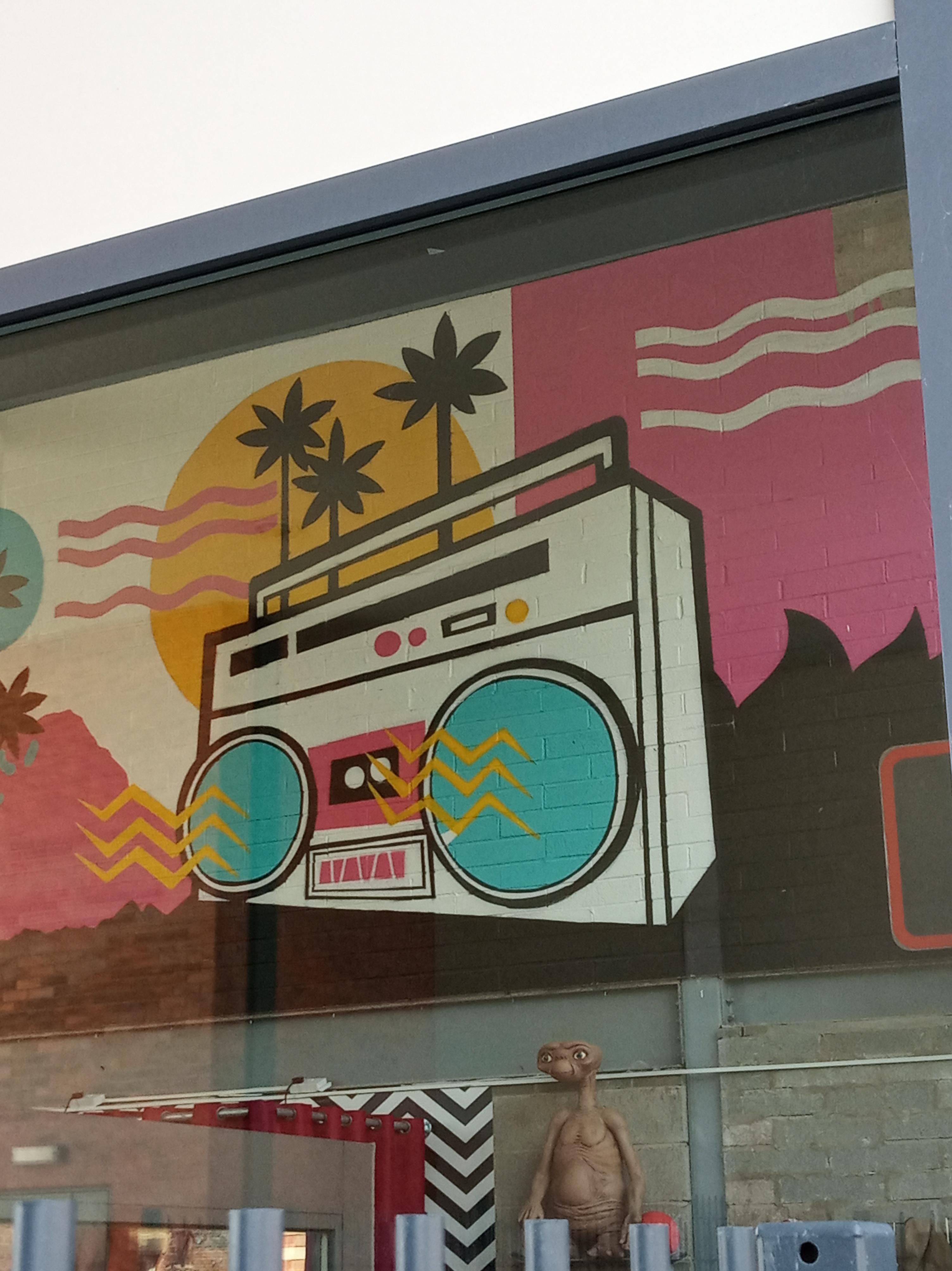 Wall painting. Vintage clothing shop Preston, UK. Hollywood Exports r