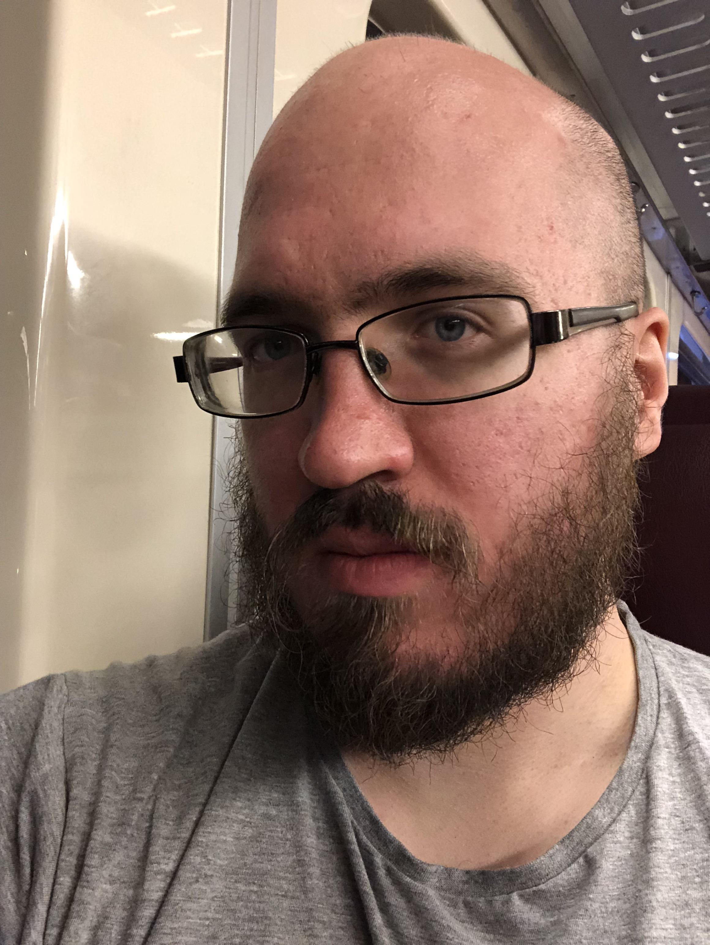 Stumbled on this sub while on a train and bored so here’s my bald and bearded mug BaldBeards