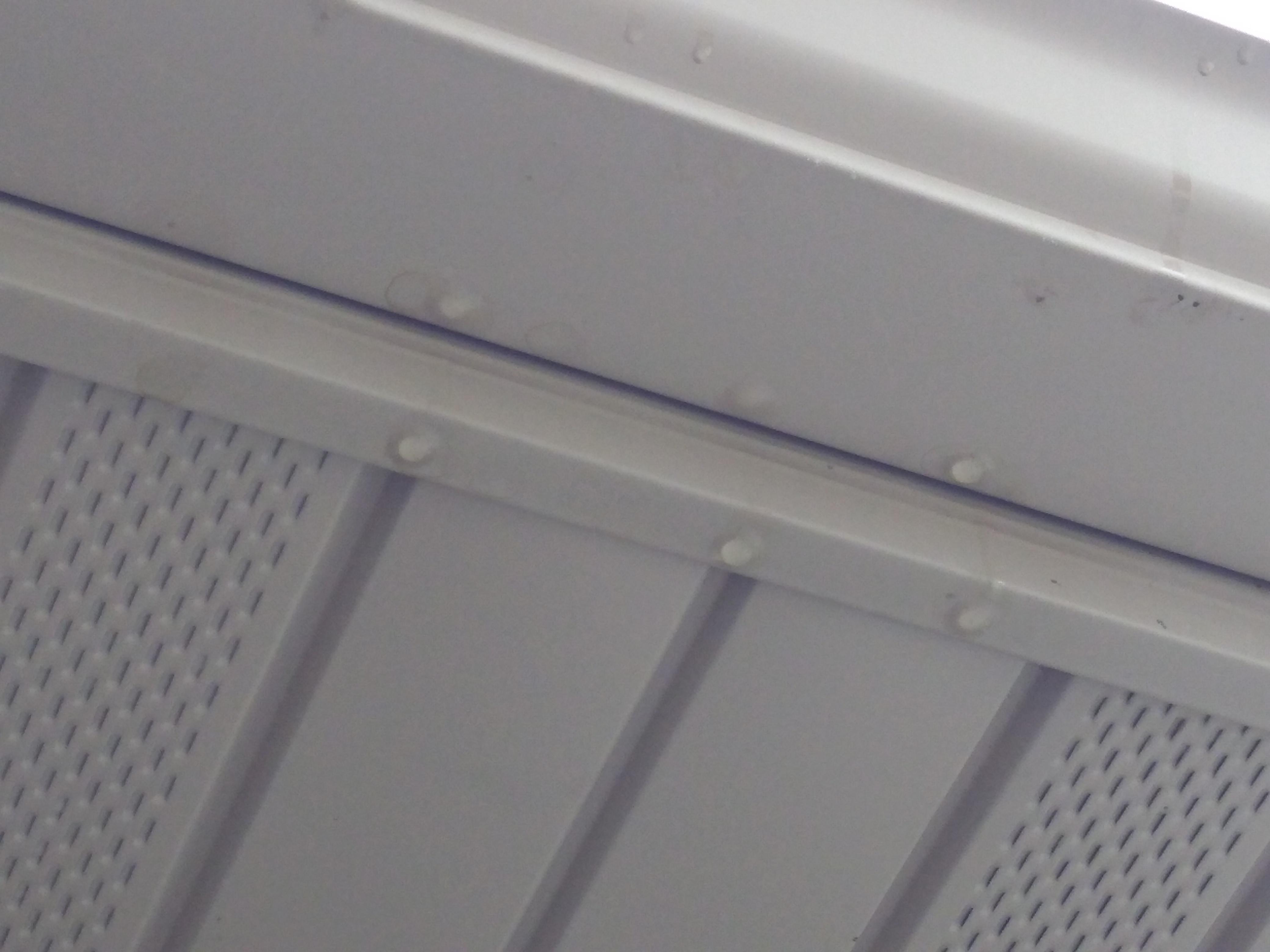Water dripping from behind rain gutter. I looked above the rain gutter