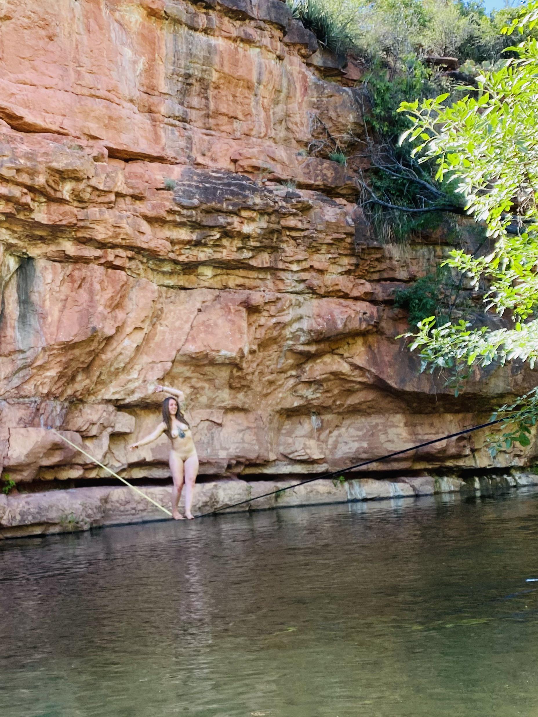 Floating naked over the water NakedAdventures