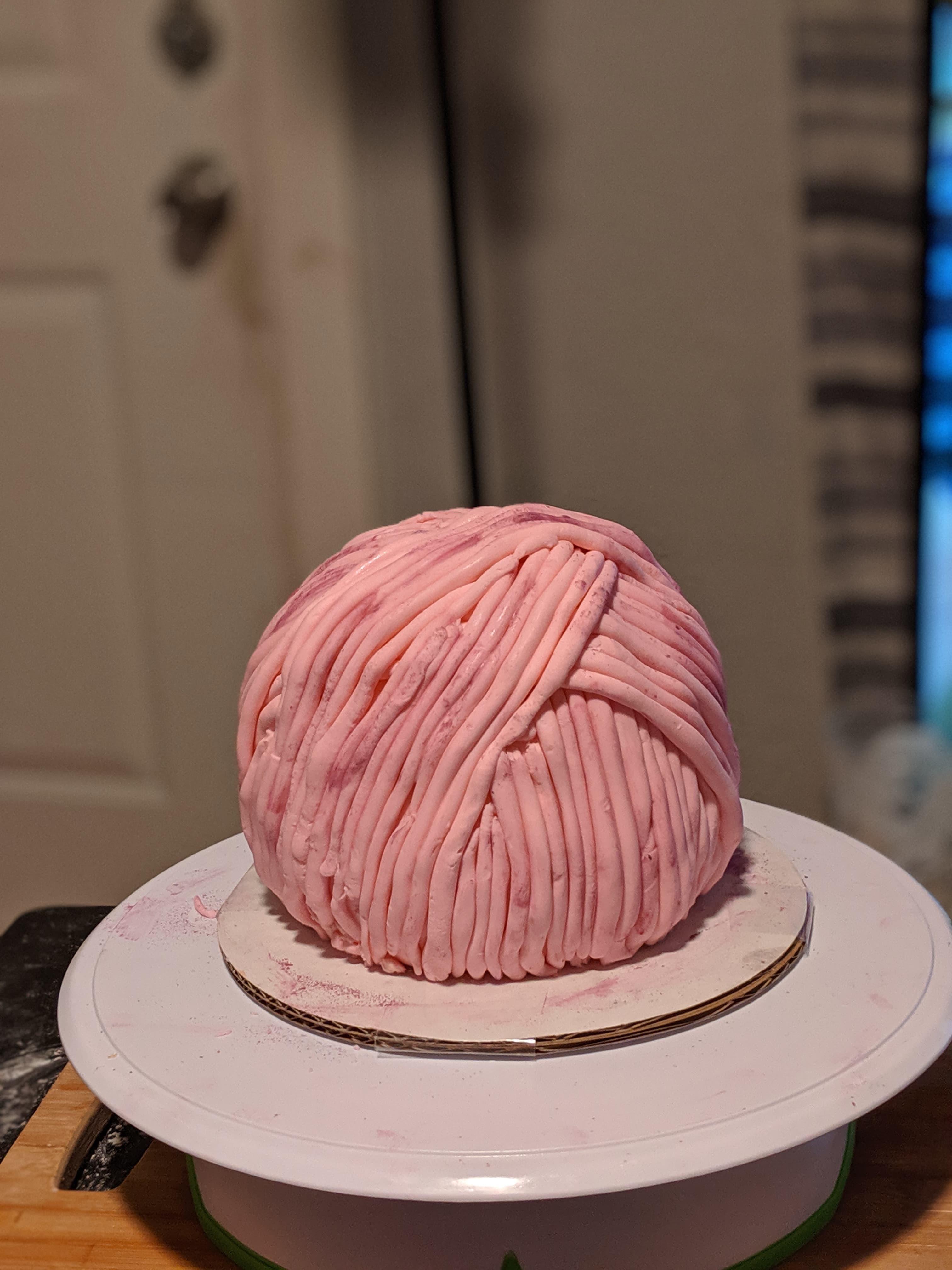 My daughter (19) made this yarn ball cake and hates it. What do you all