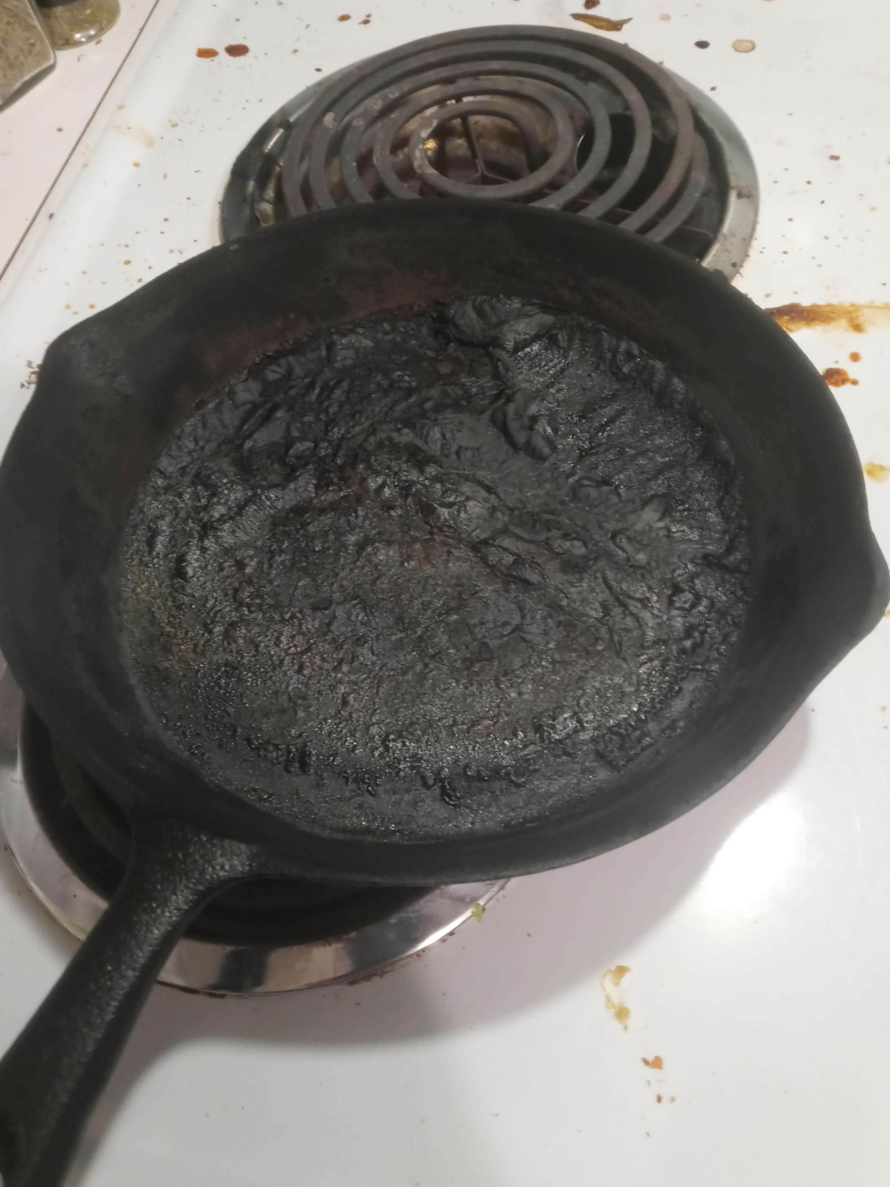 Help! My pan caught fire last night. I am fairly new to cast iron. What do I do? Is it
