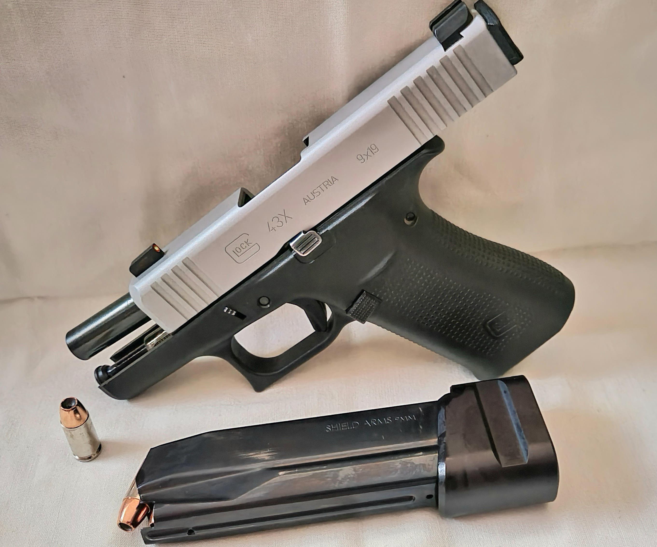 Glock 43x two tone with Shield Arms metal magazine release, Vickers