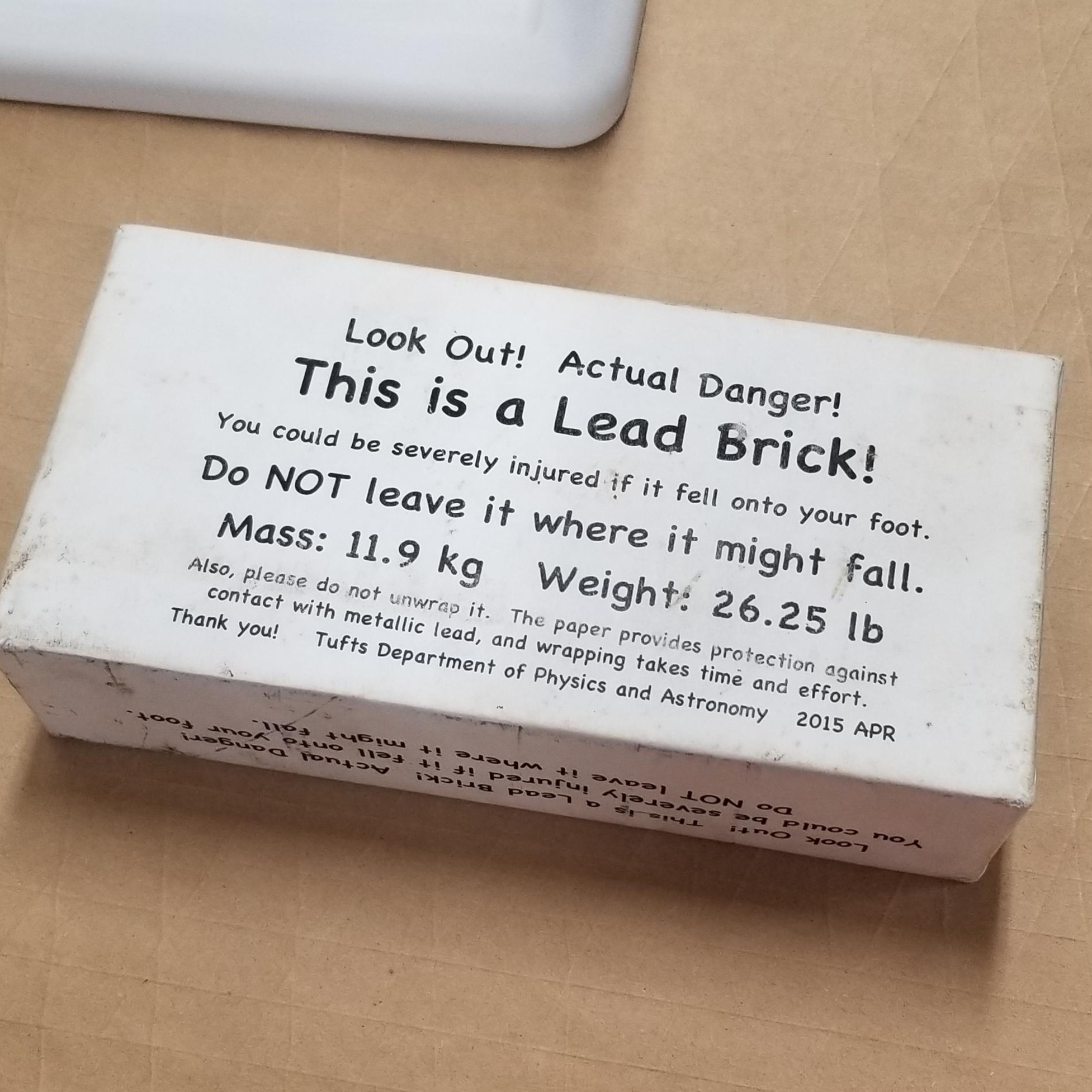 Lead brick. 100 attack speed + 4000 damage. If unwrapped deals poison