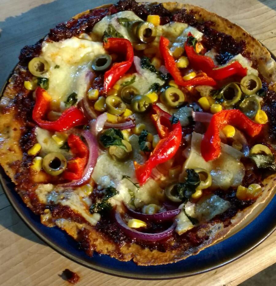 Gluten, dairy and yeast free flatbread pizza w/ mozzerella, sundried