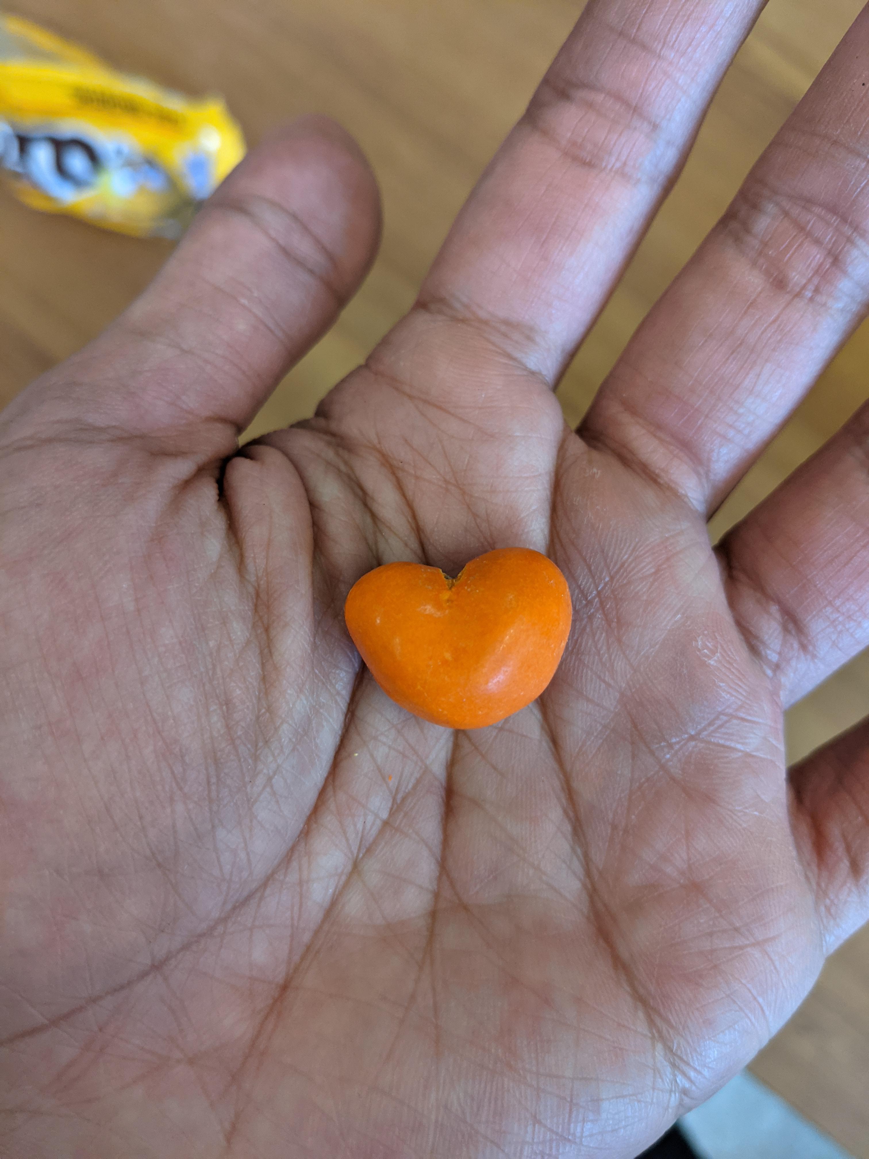 A heartshaped M&M r/mildlyinteresting