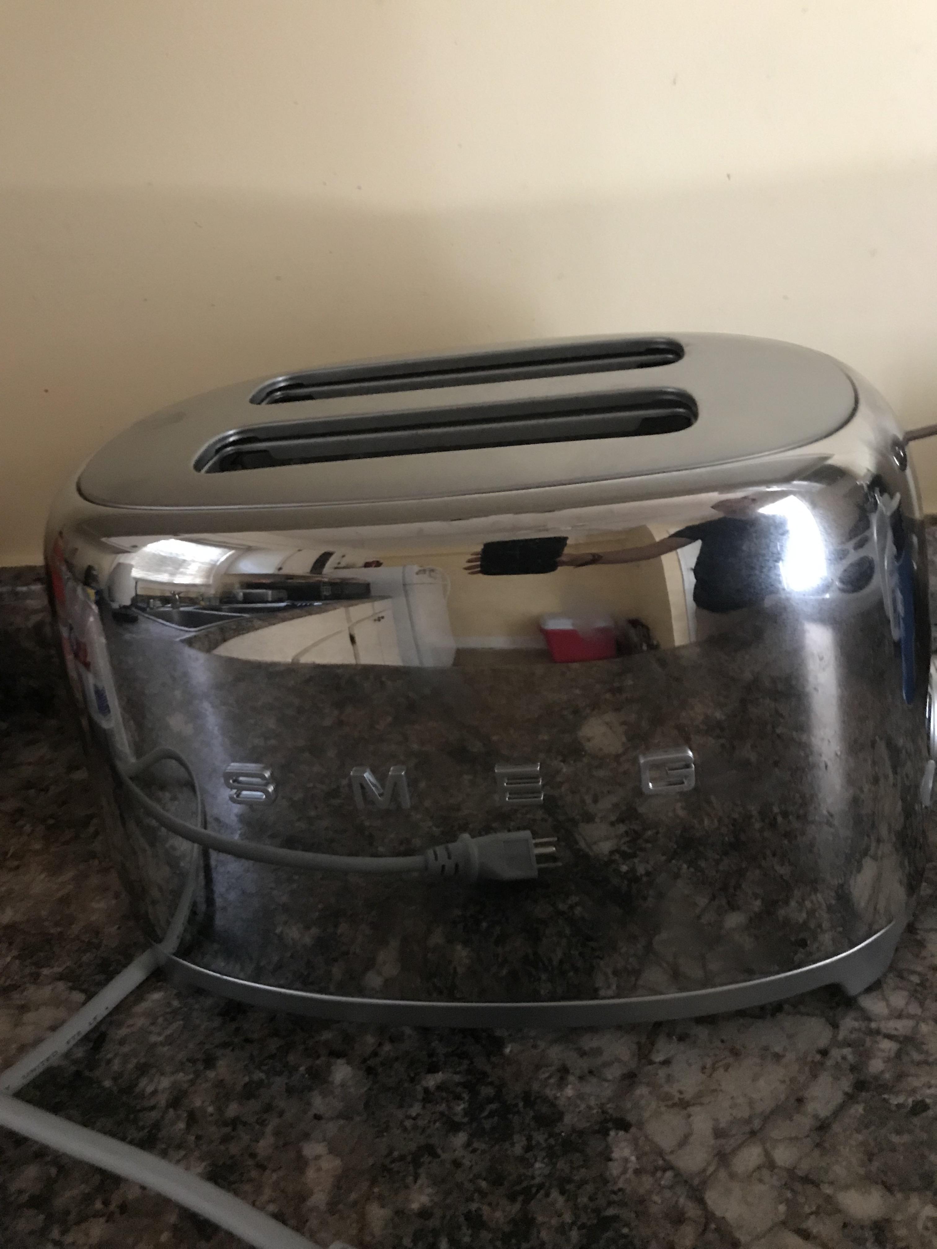 SMEG Toaster found curbside I’m trash day, literally nothing wrong with