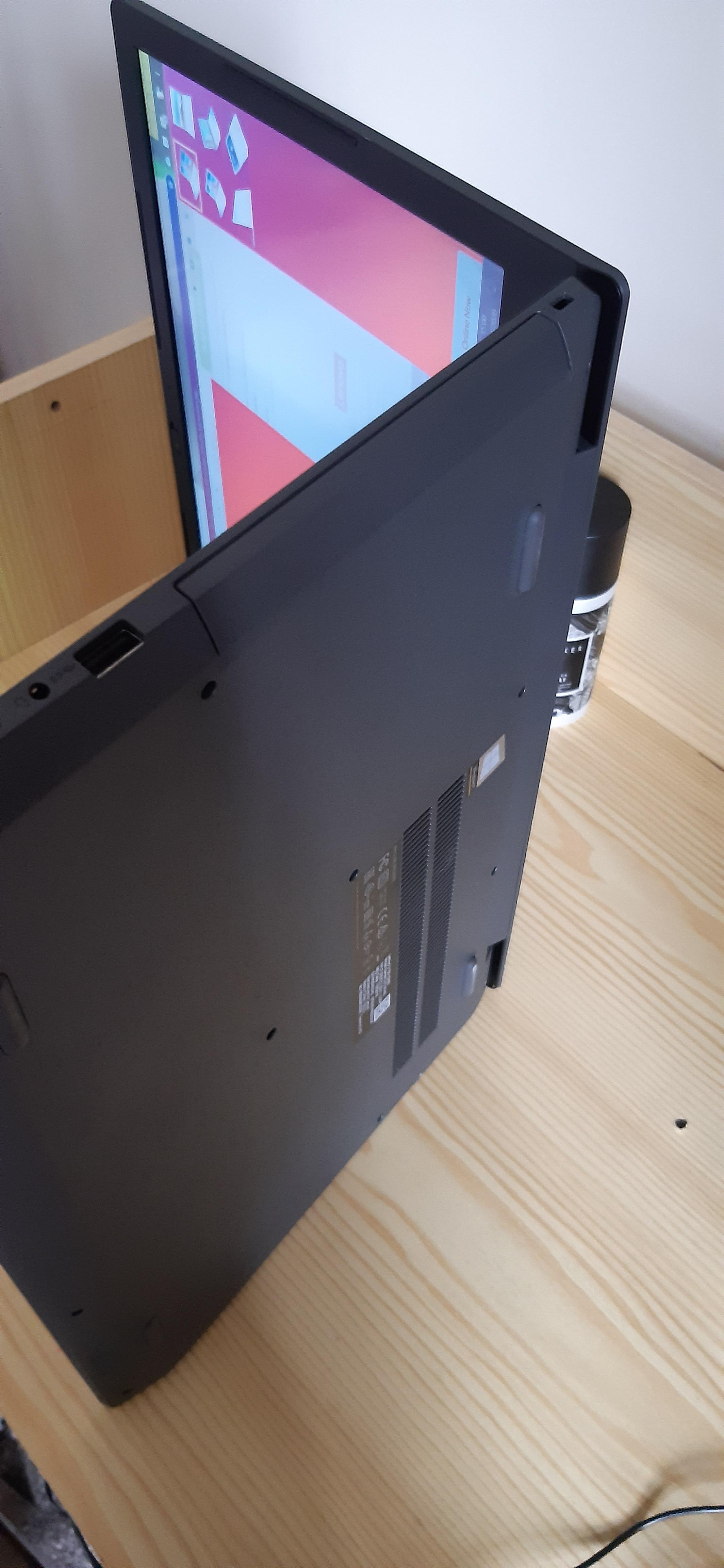 Lenovo v130 looks to have a DVD drive on The side. The specs say