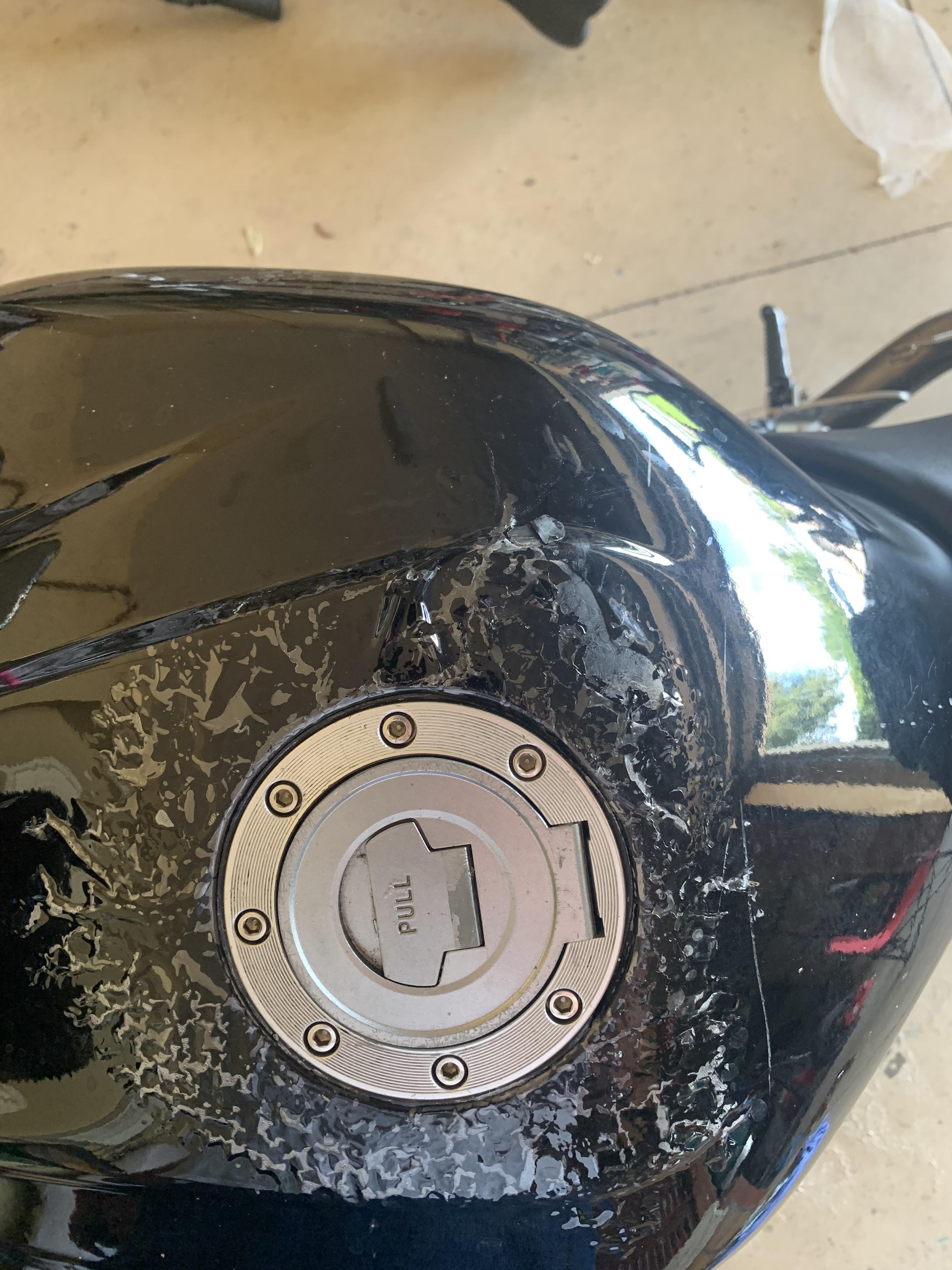 Set the tank upside down to replace gas line, now I’ve got all this messed up paint… anyone know