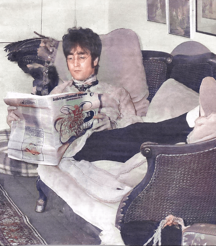 John Lennon reading at home, in Kenwood, 1967. r/beatles