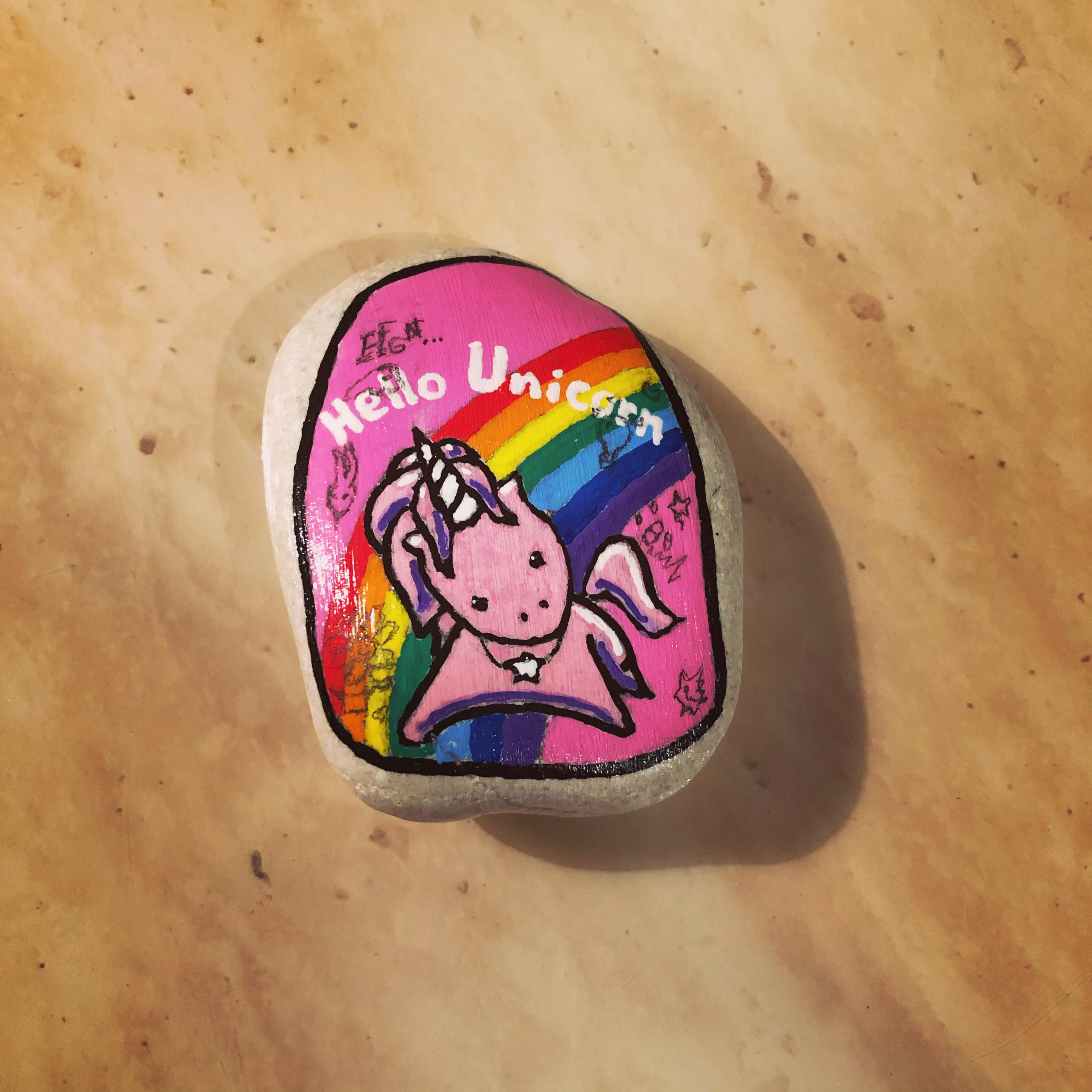 Altered Carbon’s iconic Pink Hello Unicorn Backpack. Art on a rock I