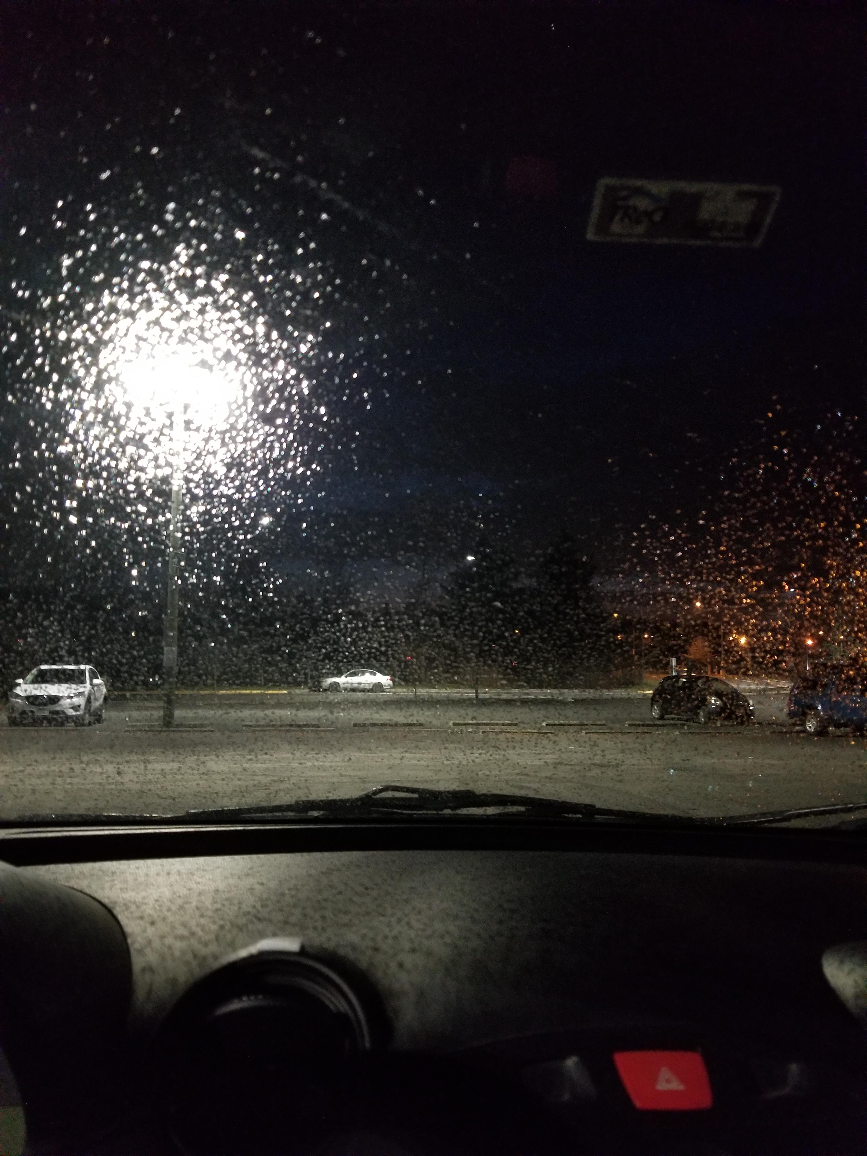 From the inside of my car at night. r/raining