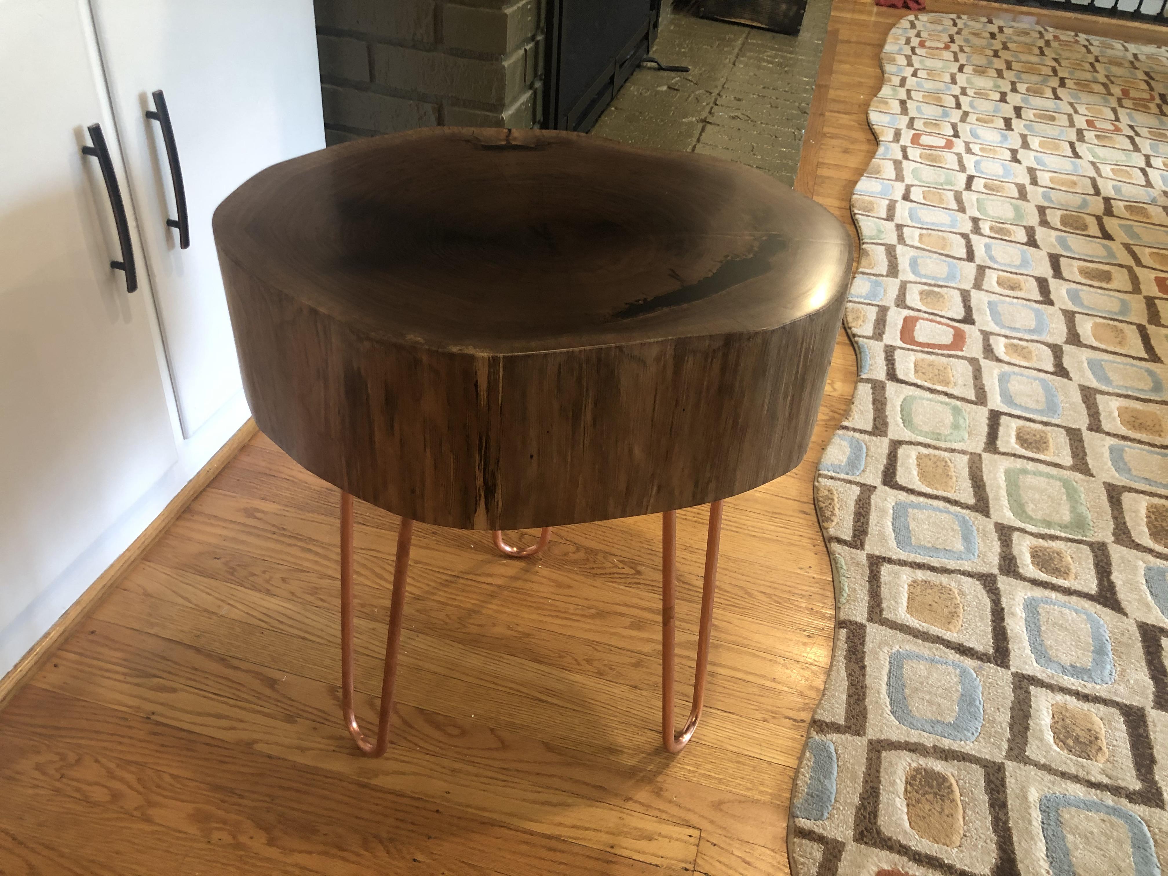 Walnut and copper. Filled the voids with black resin, flattened, and took to 3000 grit r