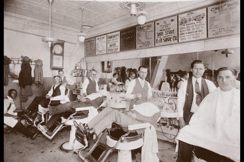 1925 in North Carolina. My grandfather is the second barber from the right. r