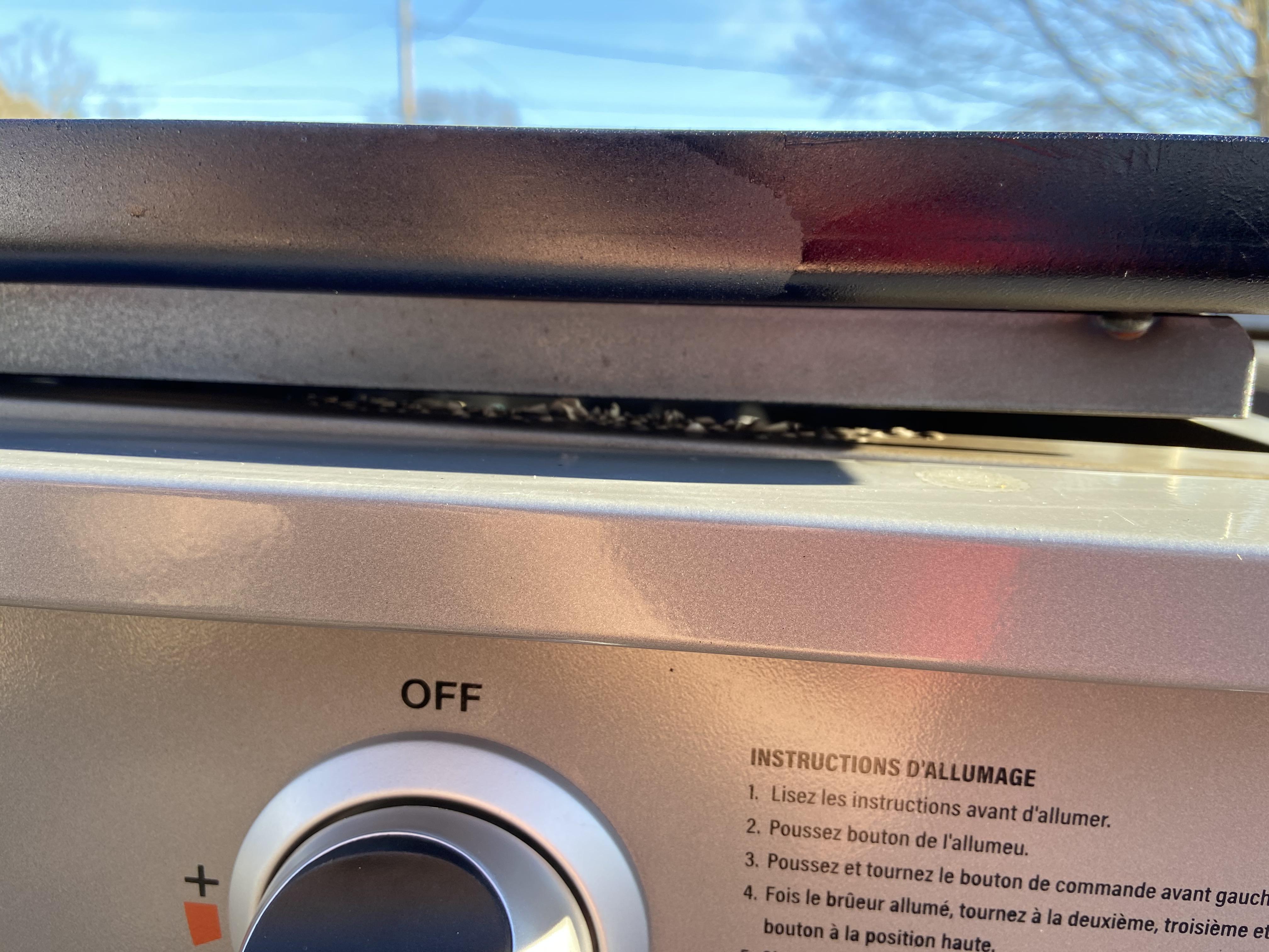 Seasoning my new blackstone pro. Paint is peeling. r/blackstonegriddle