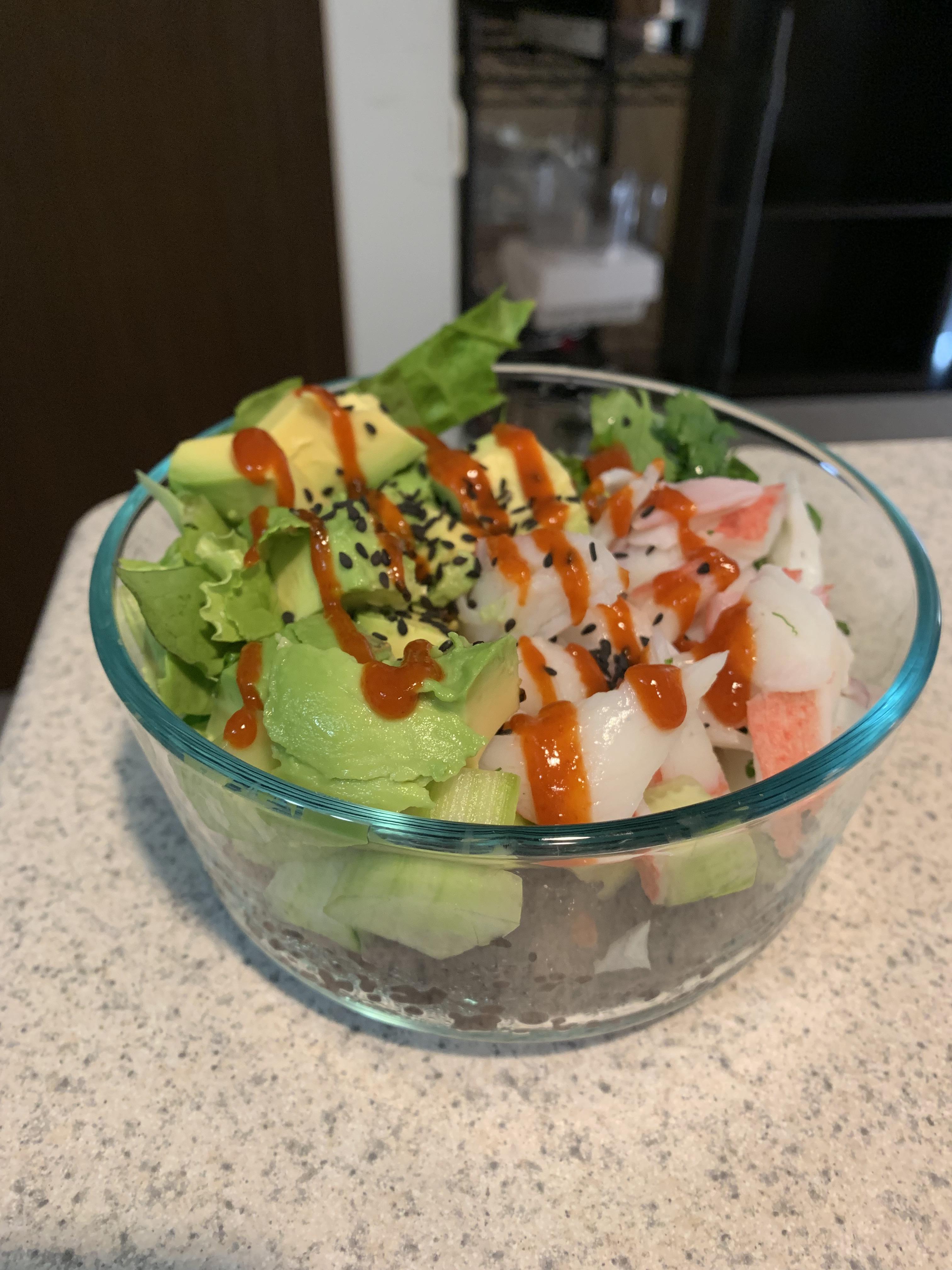 Sushi bows with black sushi rice, imitation crab, cilantro, cuke