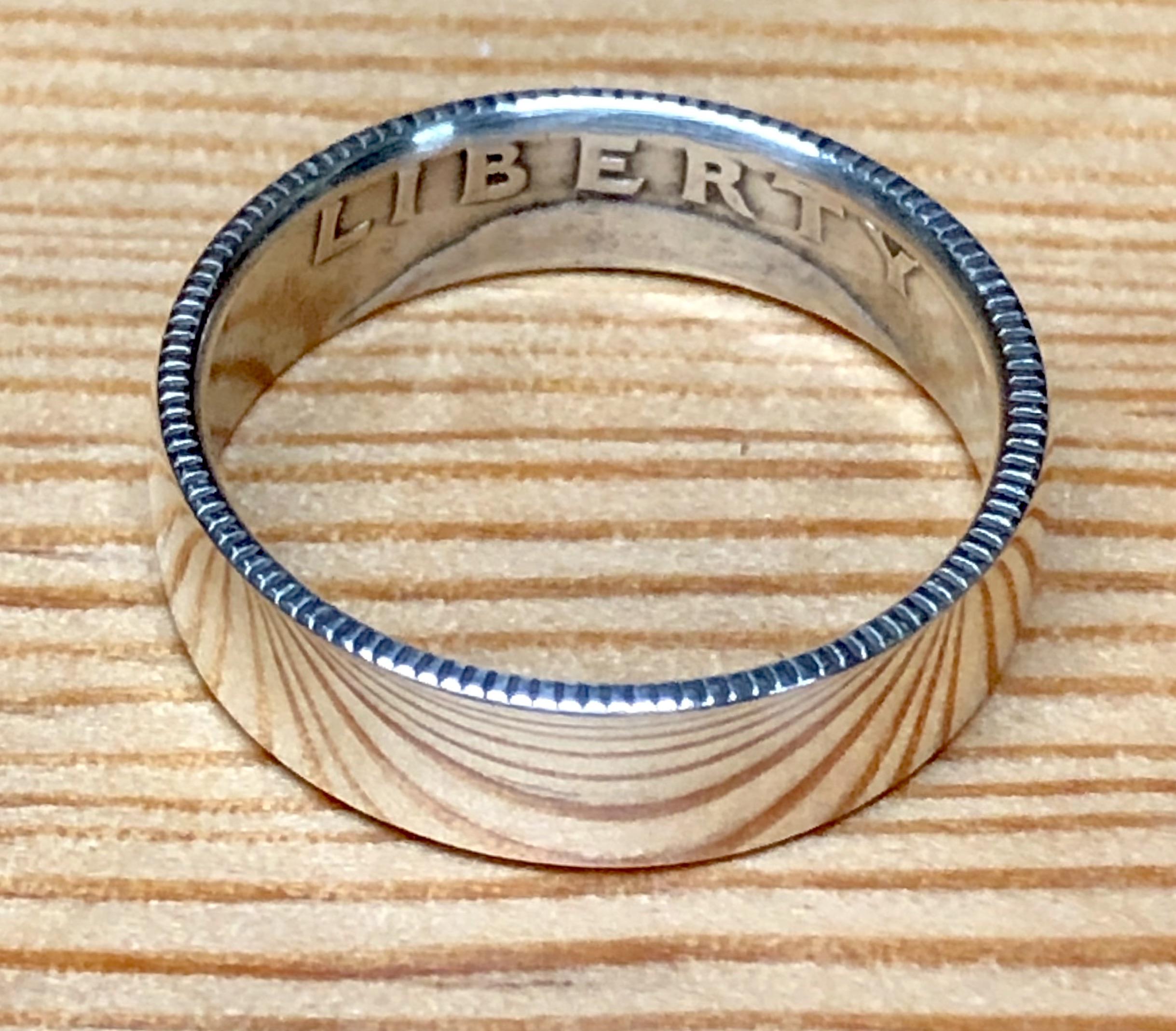 Polished silver quarter ring. r/coinrings