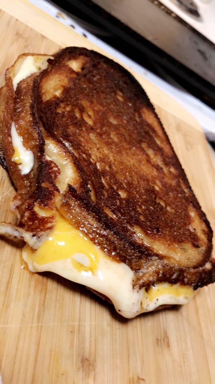 Havarti, Muenster, and Medium Cheddar on Sourdough made on cast iron