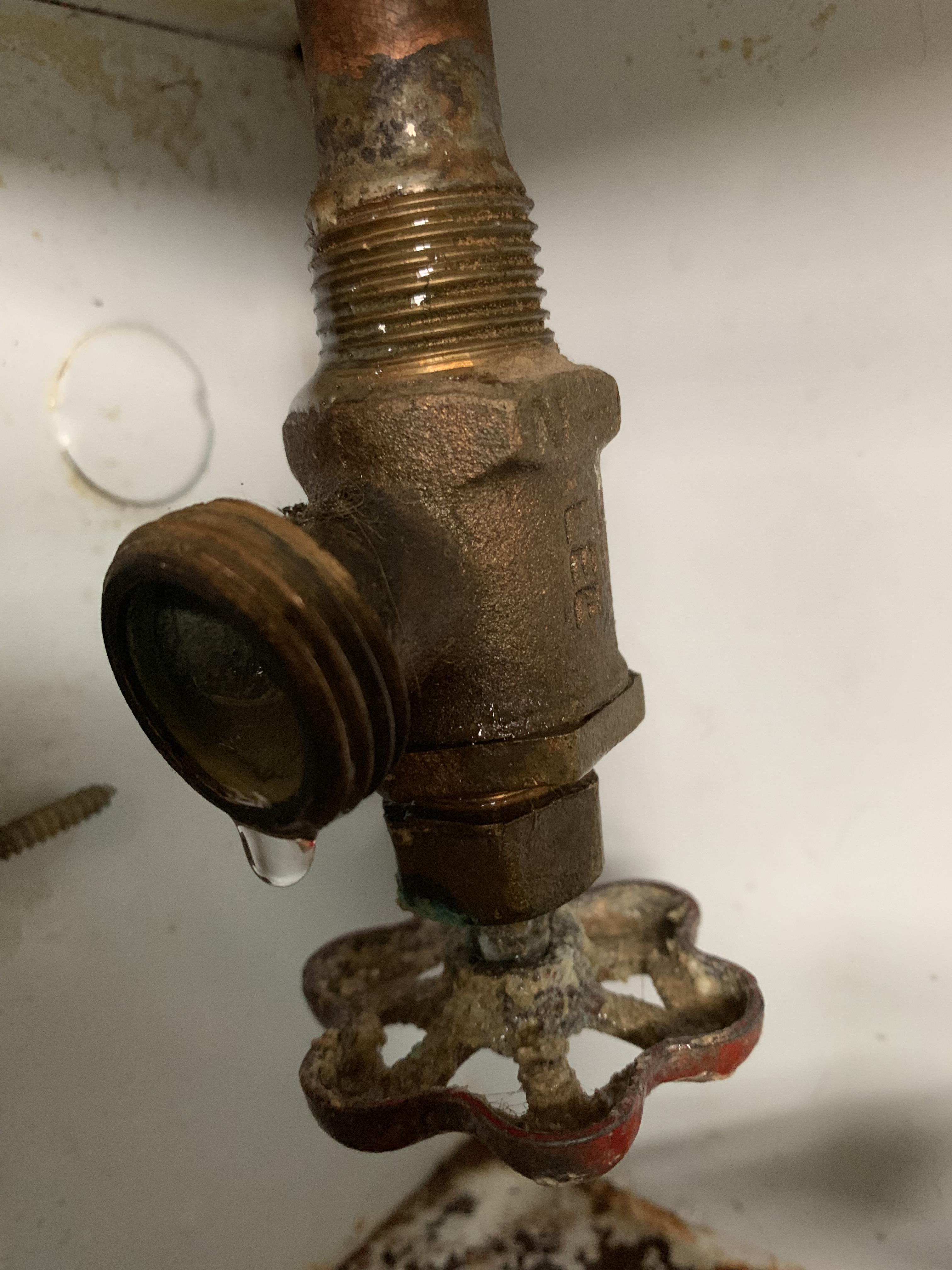 Trying to hook up hot water to my moms washer. Water leaking at handle