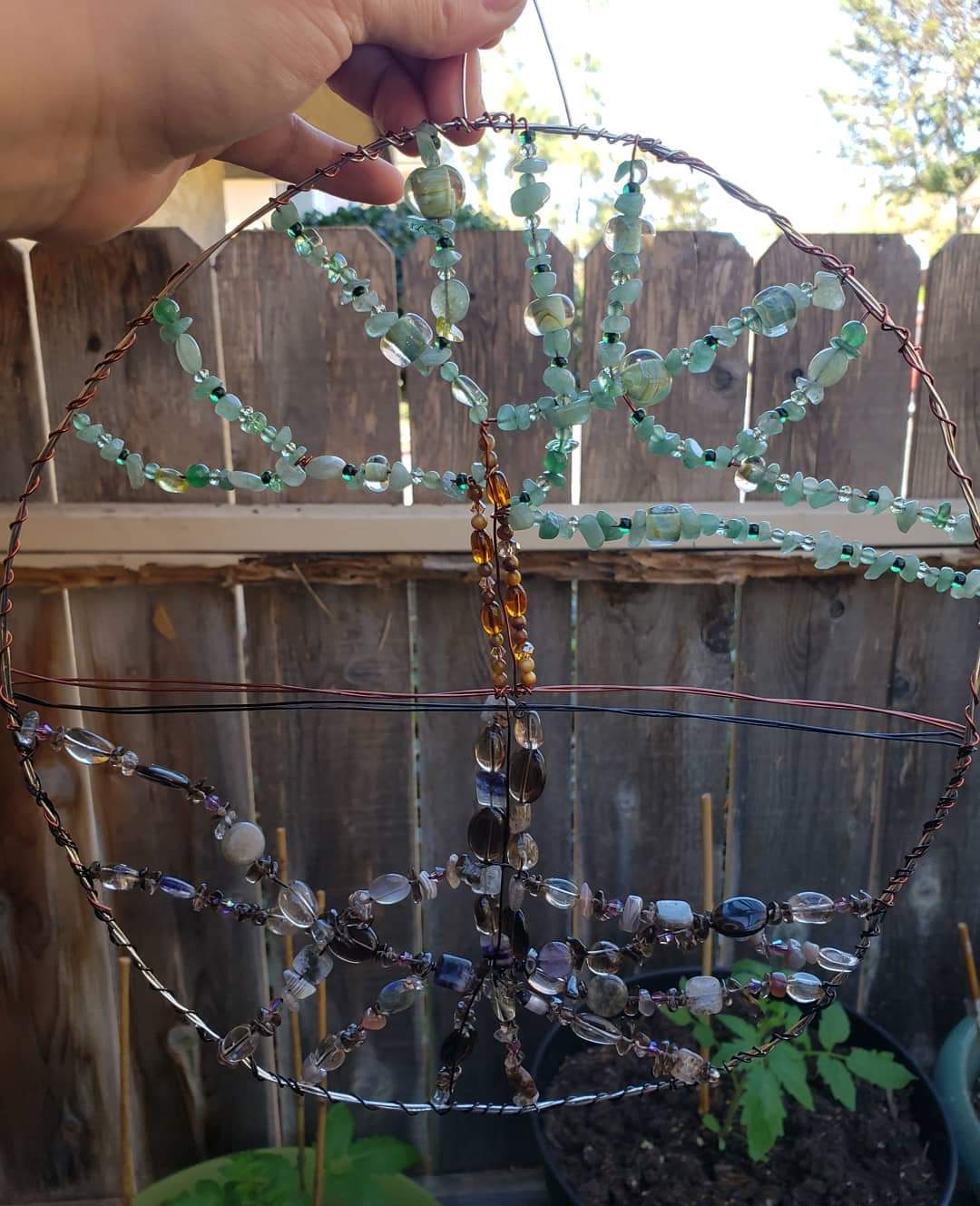 I made this garden decoration out of my old jewelry making supplies. As
