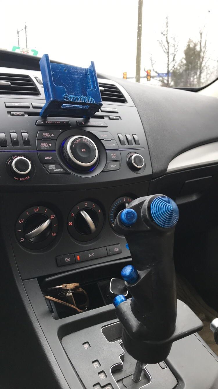 Printed a phone holder and new shift knob! r/3Dprinting