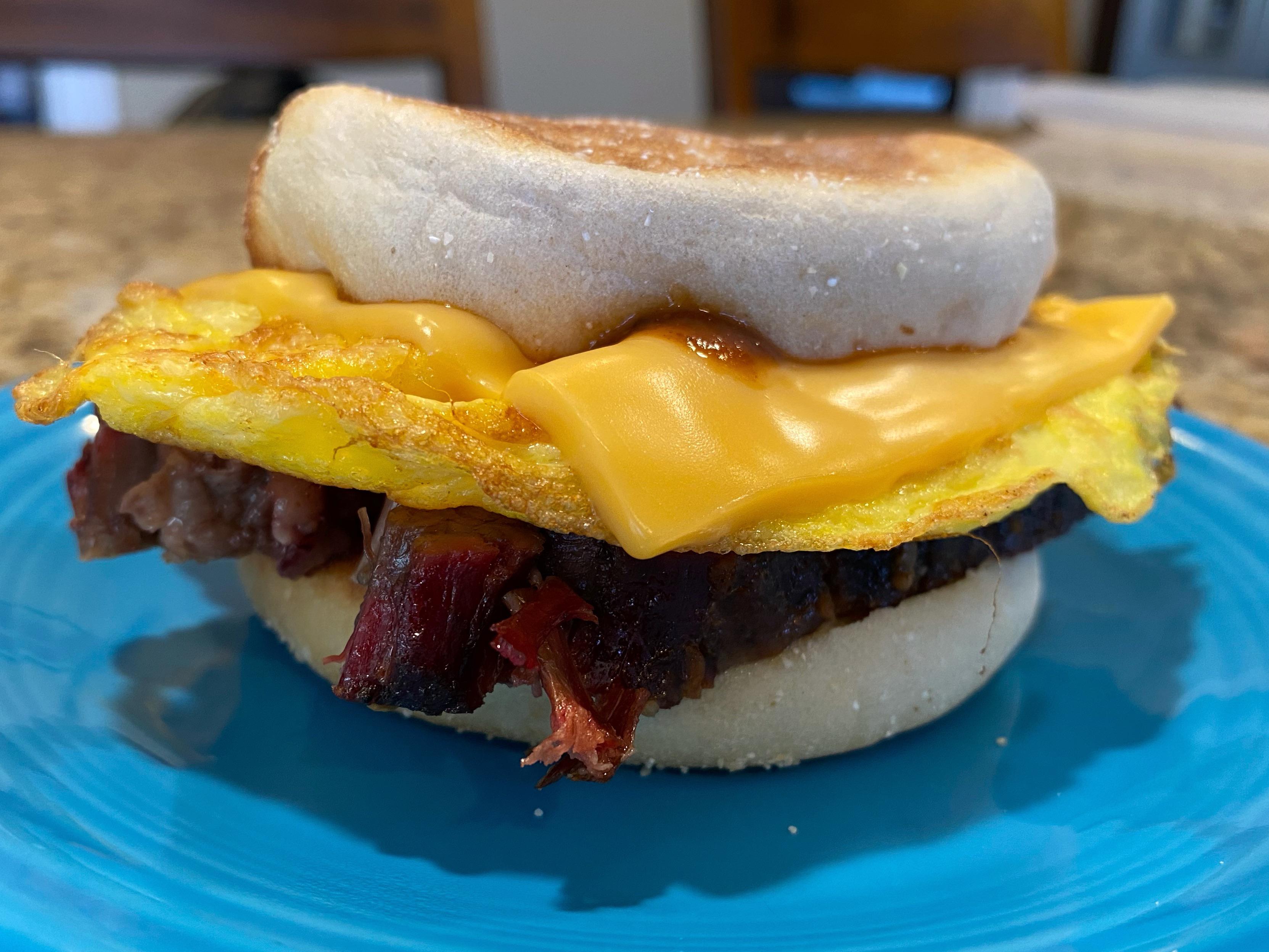 Breakfast sandwich with leftover smoked brisket, egg, cheese, and